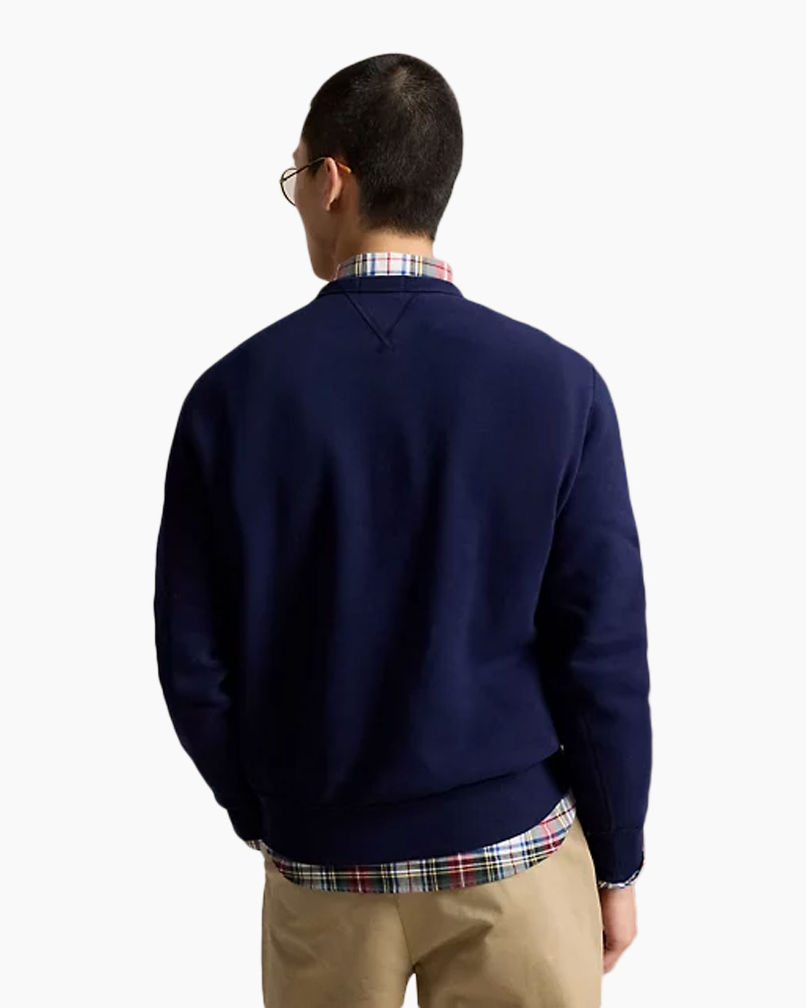 navy sweater, crewneck, plaid shirt, layered look, back view