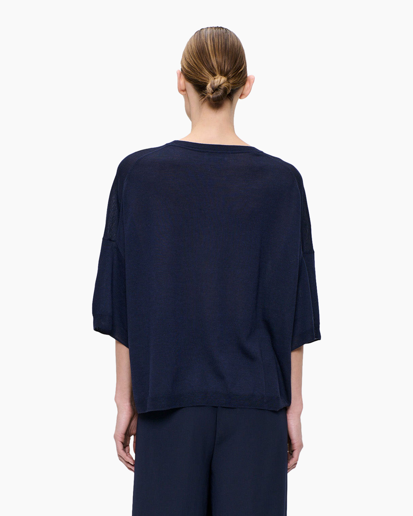 navy top, loose fit, short sleeves, back view, knit fabric
