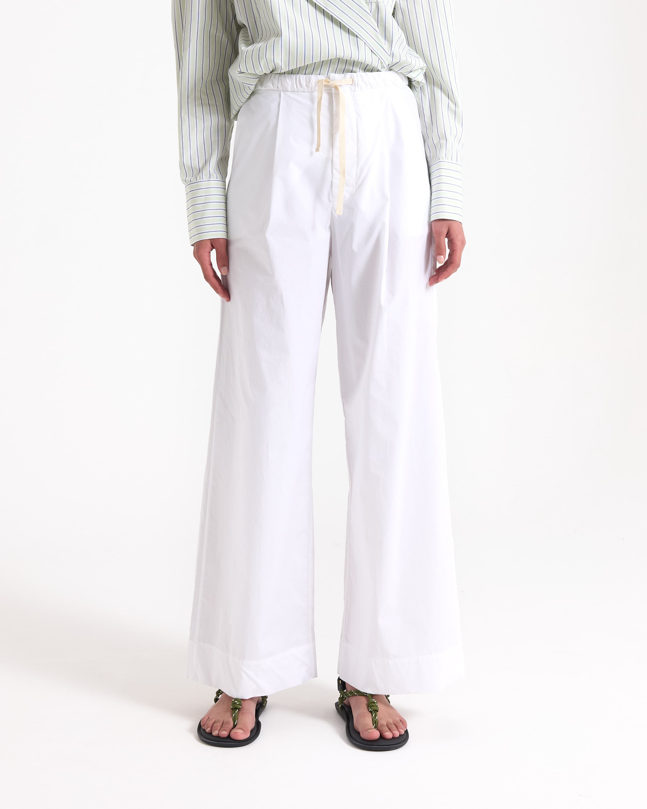 denim jacket, blue jacket, white wide pants, striped shirt, sandals