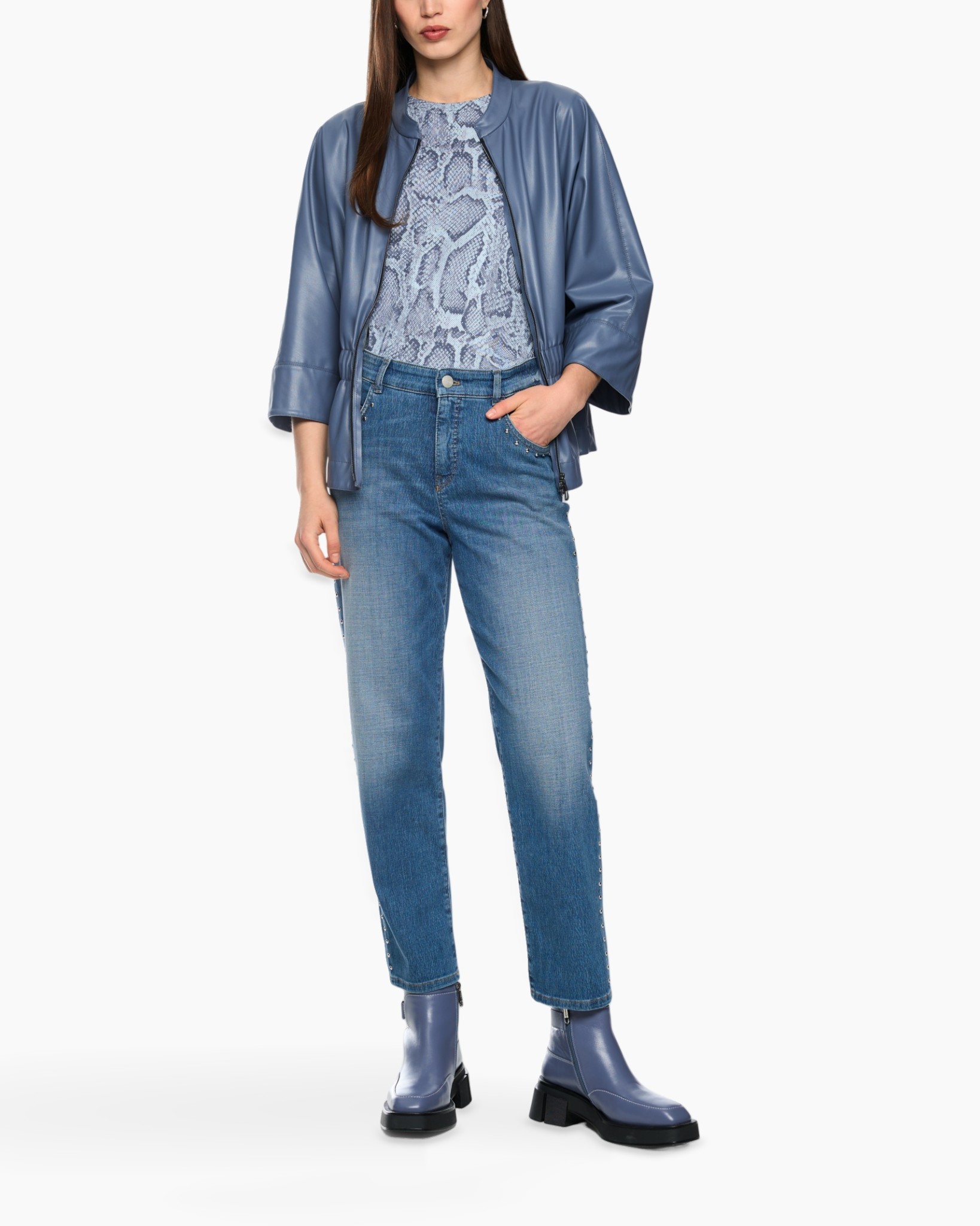 leather jacket, light blue, snake print top, jeans, ankle boots