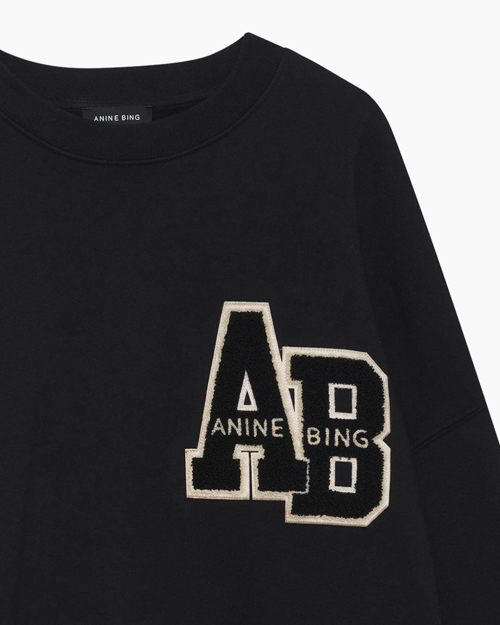 sweatshirt, black, applique, lettered graphic,  oversized patch