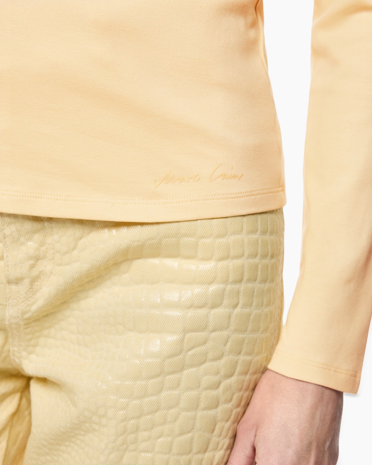 top peach, long sleeve, solid color, smooth fabric, signature label