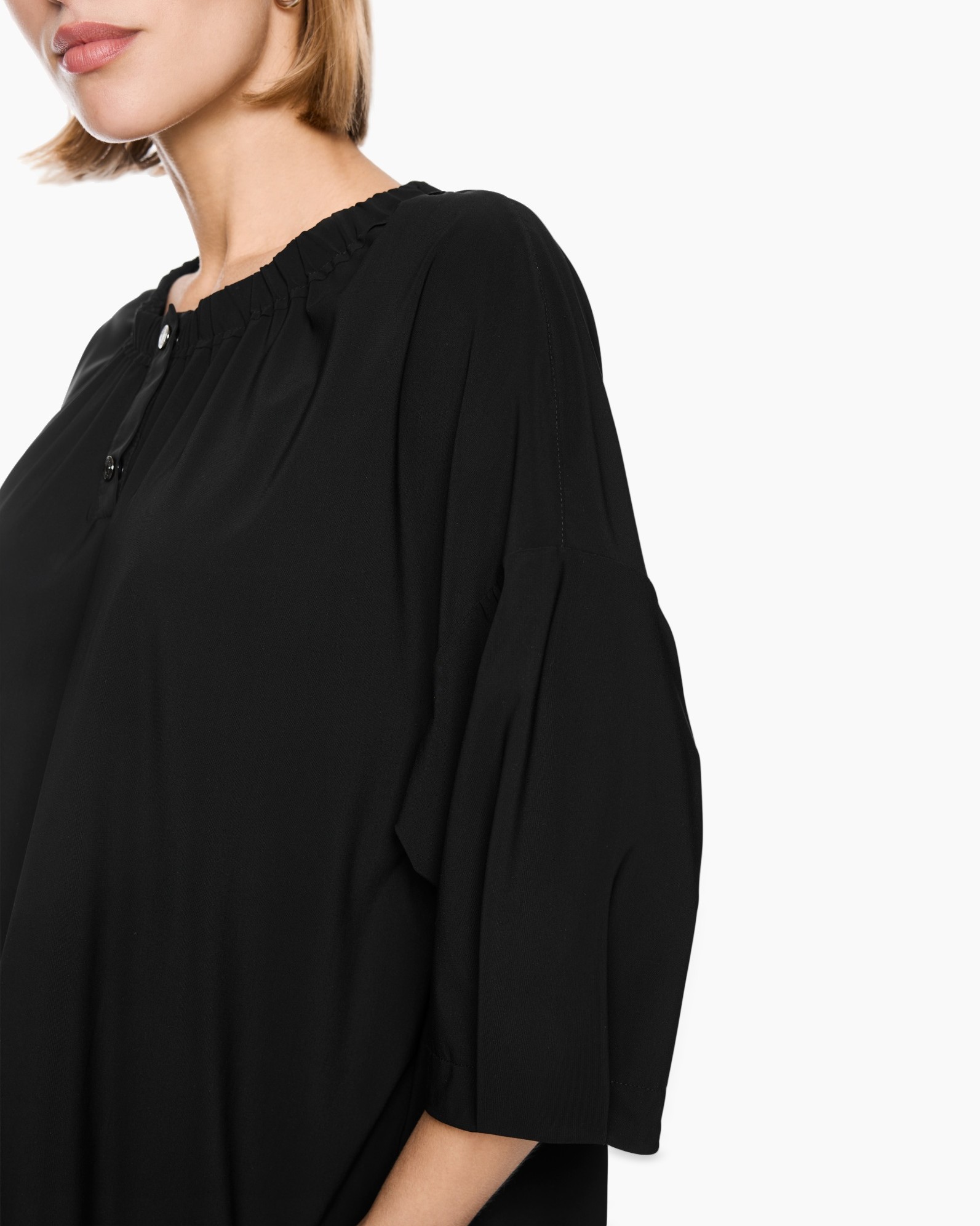 black blouse, pillowy sleeves, loose fit, elastic neckline, button placket