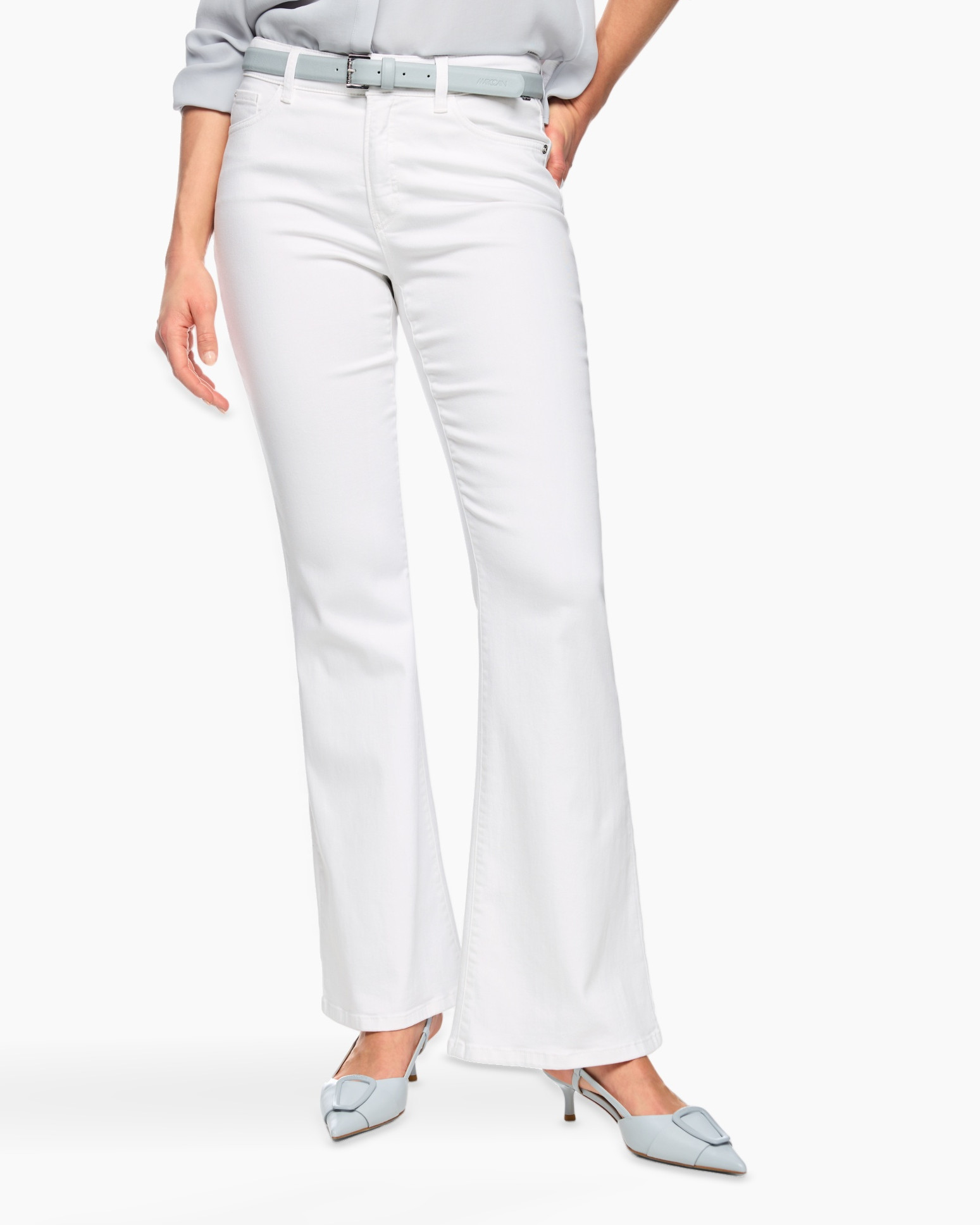 white pants, flared jeans, belted, light blue shoes, high heels