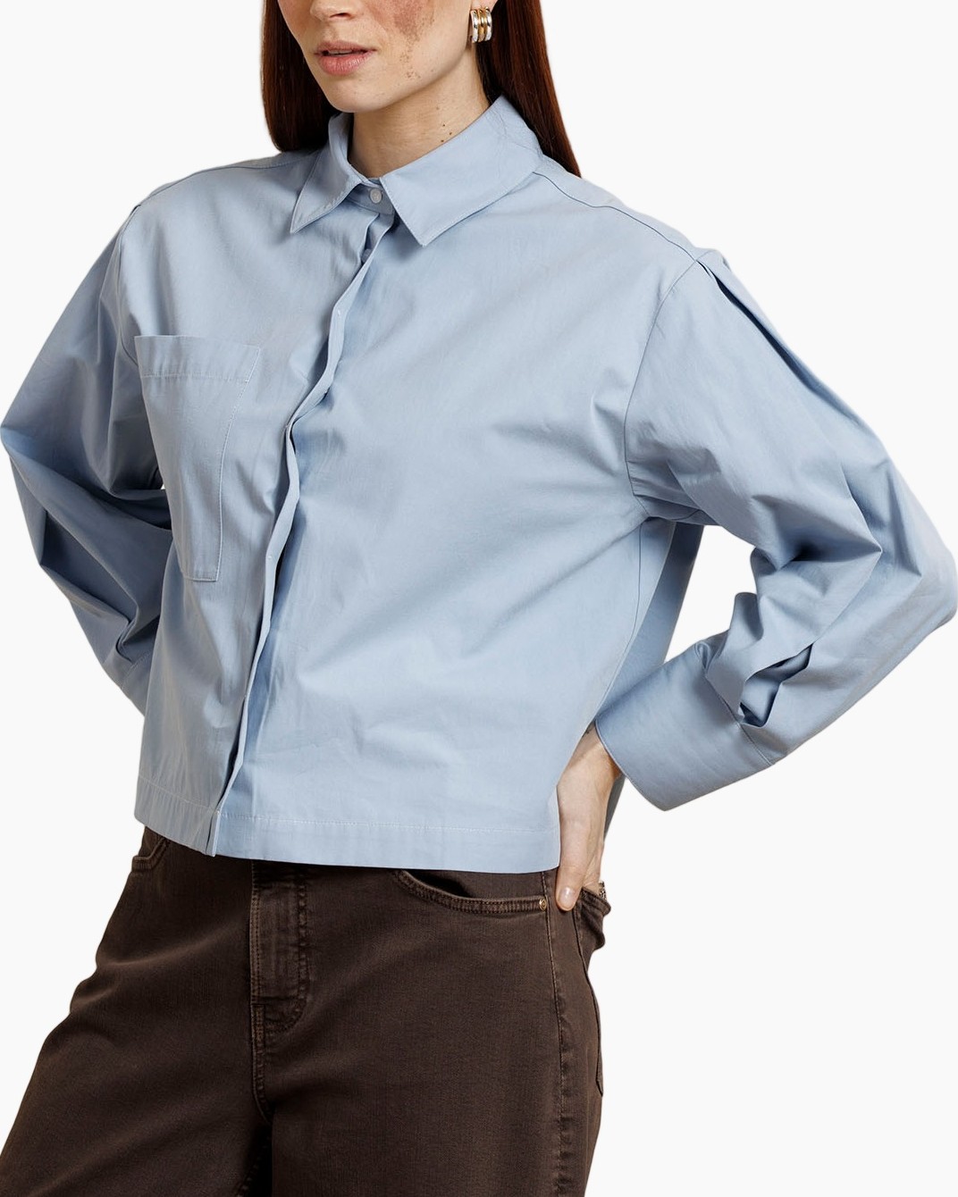 light blue shirt, button-down, collar, pocket, long sleeves