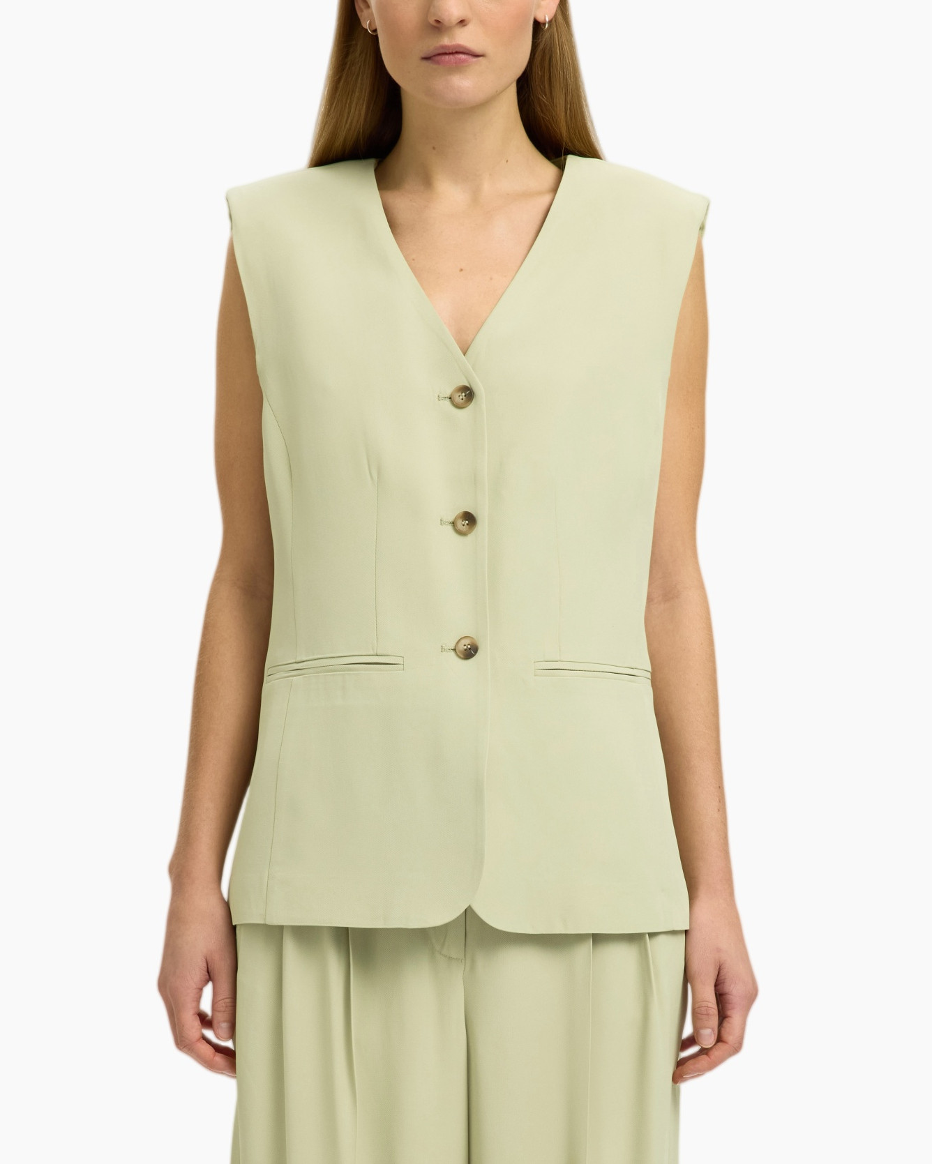vest, sleeveless, buttoned, pocketless, pastel-green