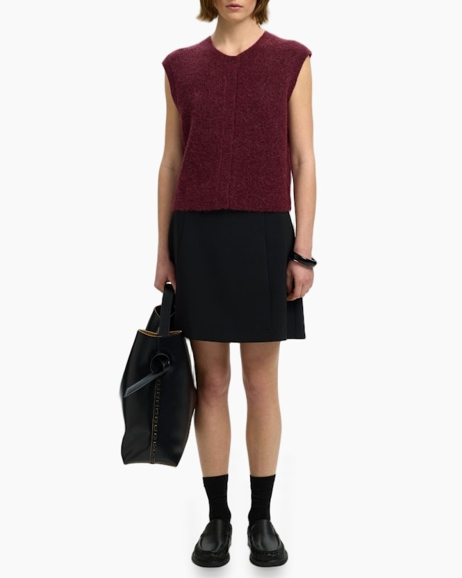 loose-knit top, sleeveless sweater, burgundy, crew neck, black skirt
