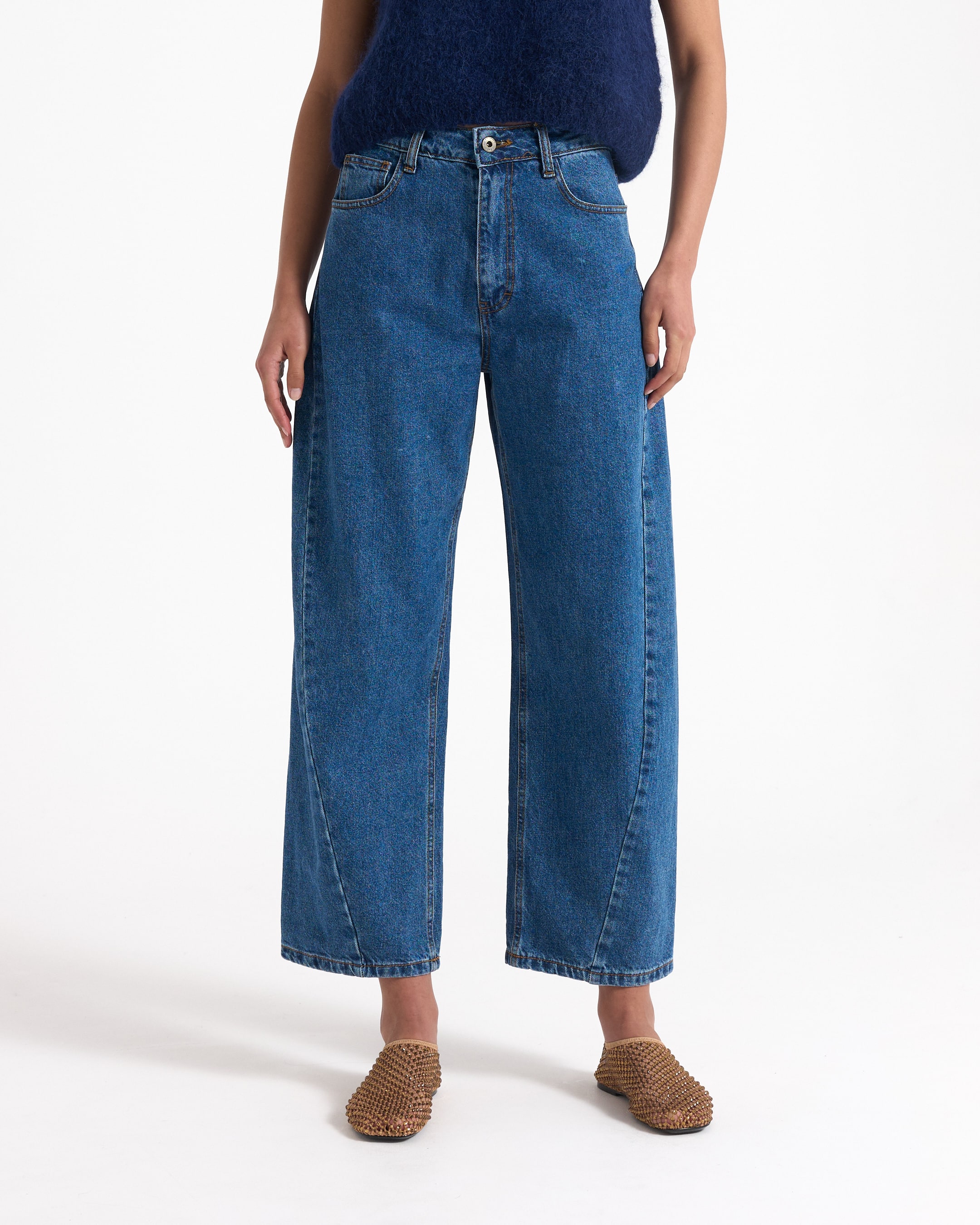 sleeveless top, knit top, navy blue, high-waisted jeans, wide-leg jeans