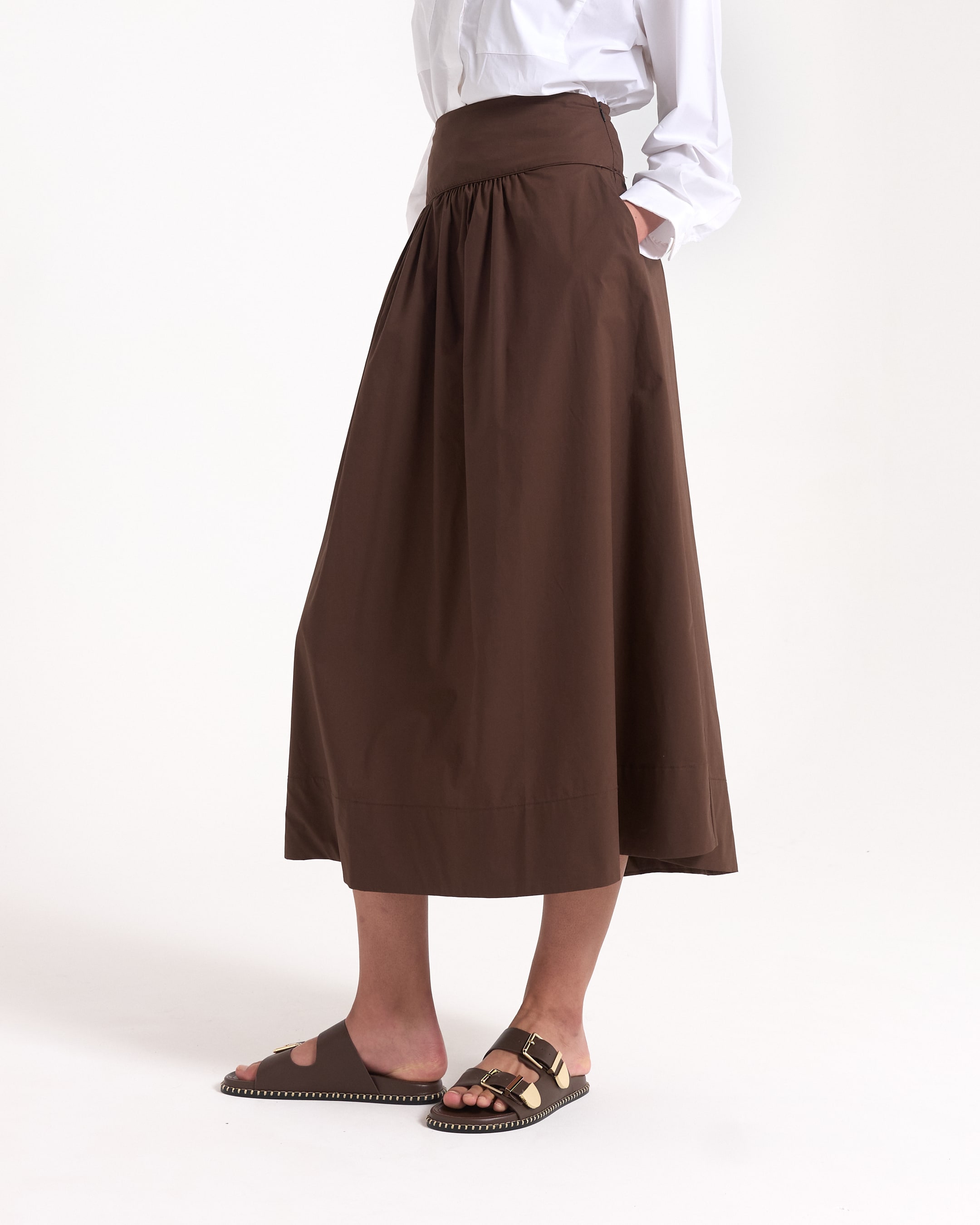 white shirt, button-down, pocketed, collared, brown skirt