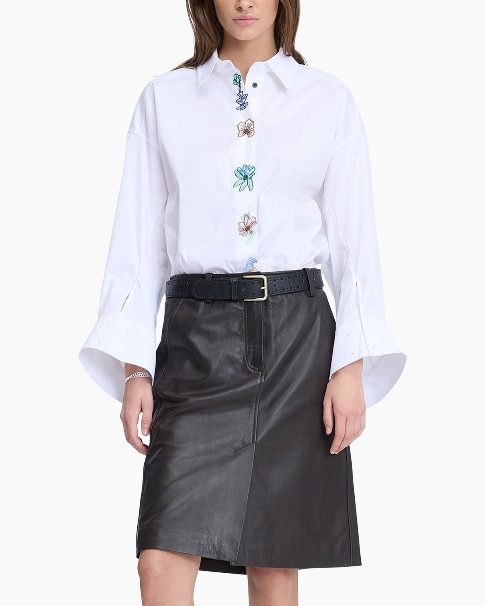 white shirt, embroidered placket, flared sleeves, black leather skirt, belted