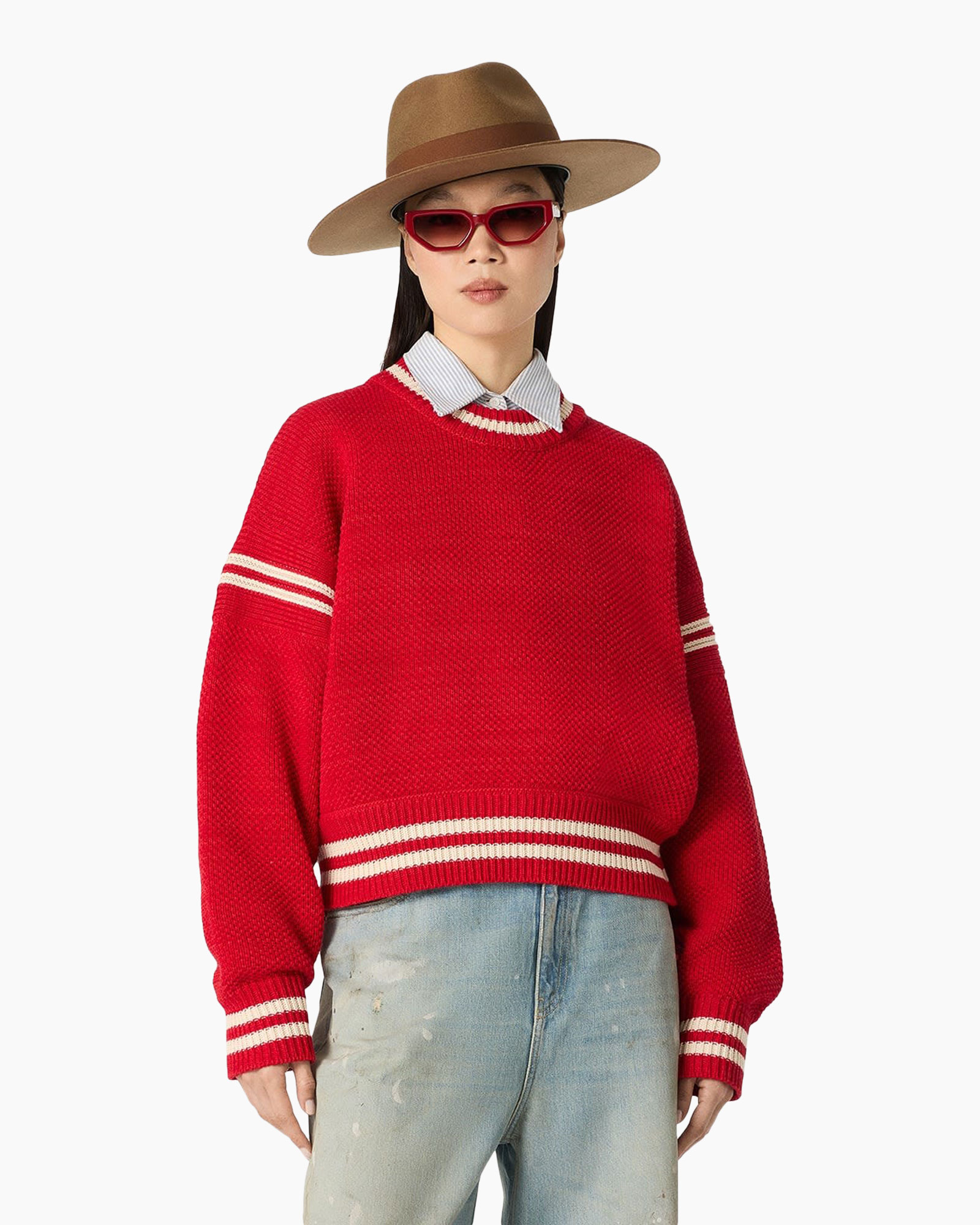 red sweater, crewneck, striped cuffs, distressed jeans, fedora hat