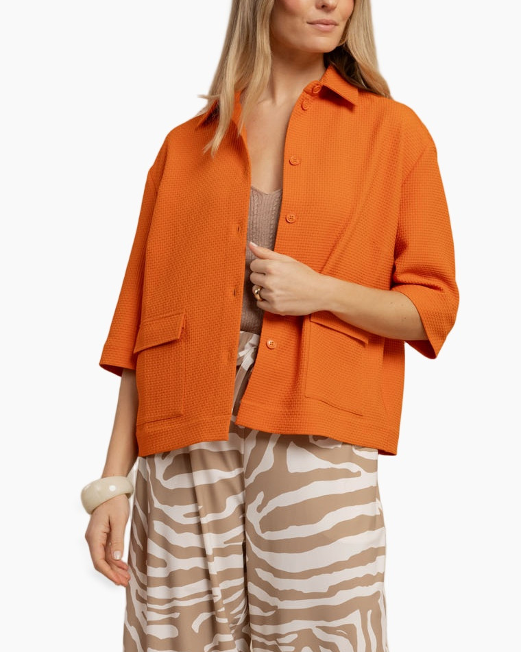orange jacket, cardigan, textured fabric, long sleeves, pockets