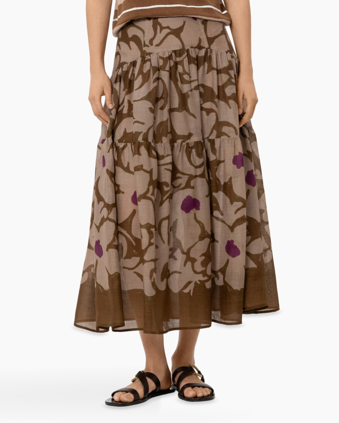 skirt, maxi skirt, abstract print, braid? no, camouflage pattern, brown color, floral spots, sandals? not product