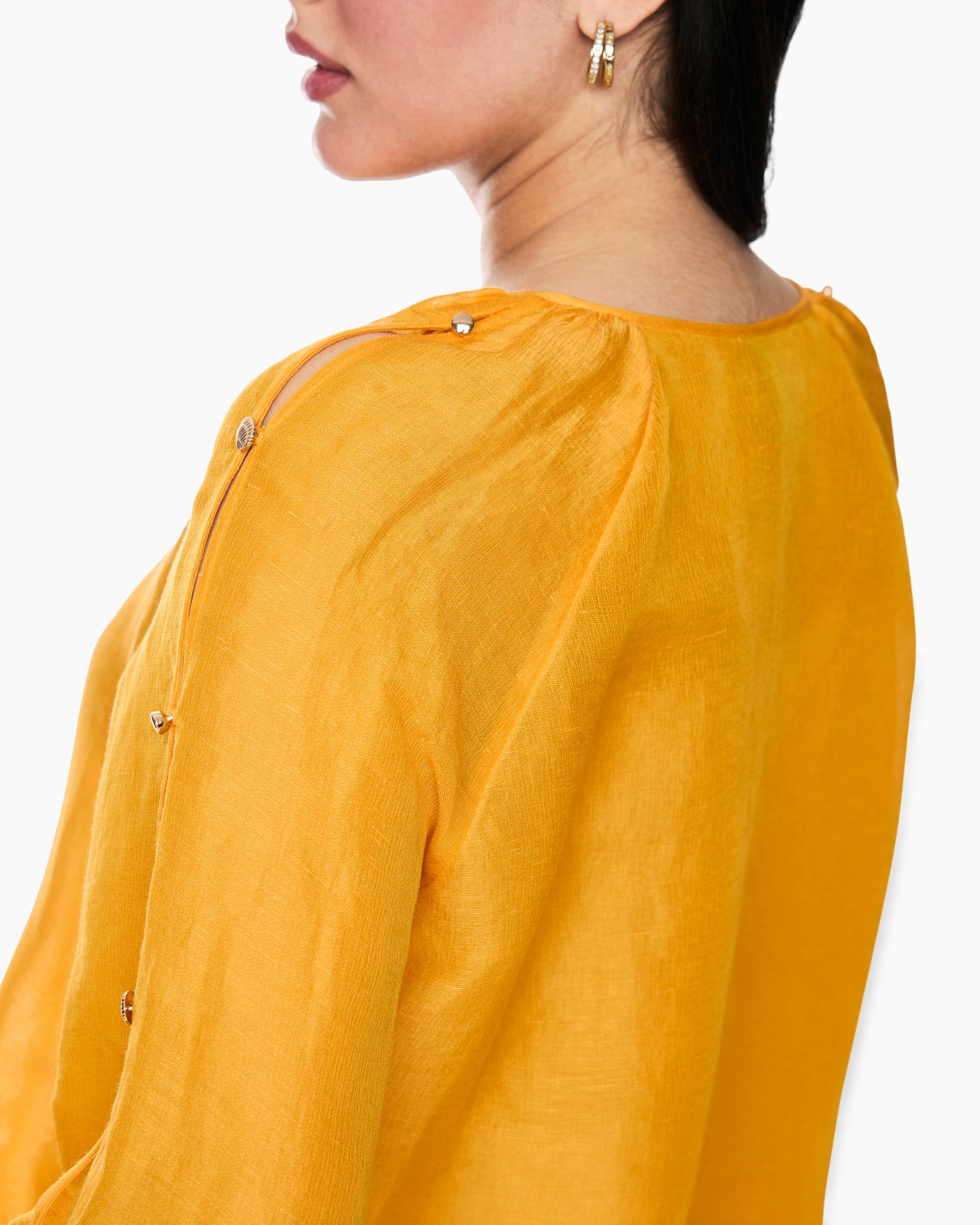 yellow top, linen fabric, shoulder detail, button placket, ecru/gold jewelry not necessary