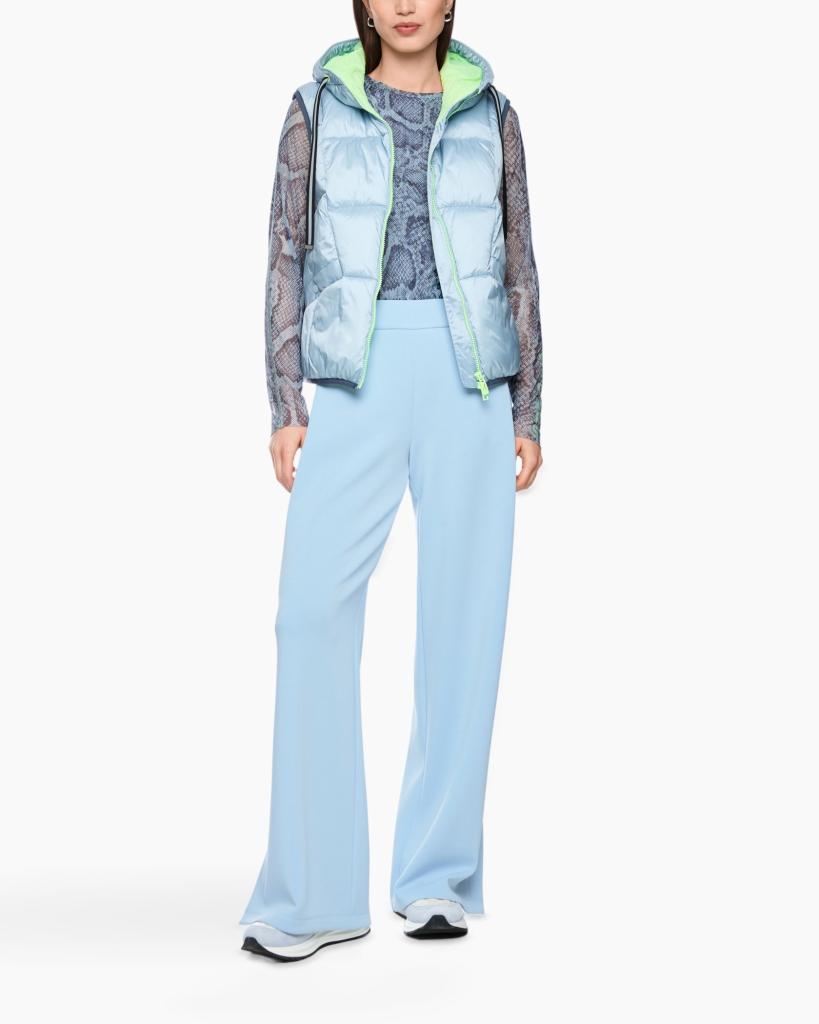 puffer vest, hooded vest, light blue, snake print sleeves, wide-leg pants