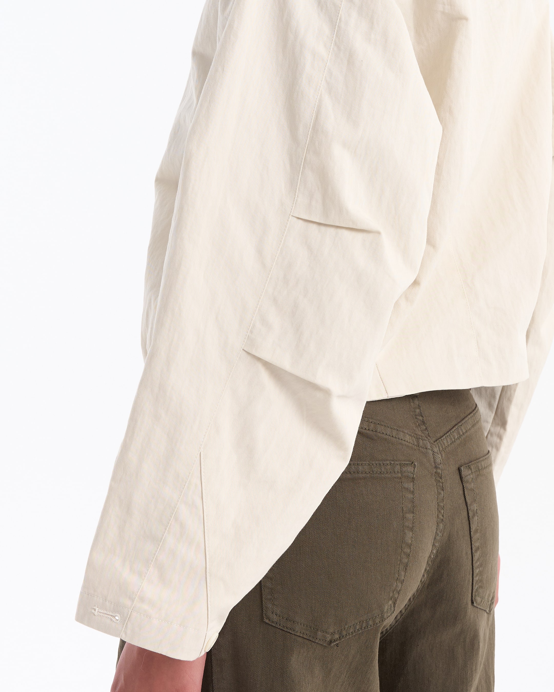 beige shirt, long sleeve, light jacket, pocket flap, brown pants