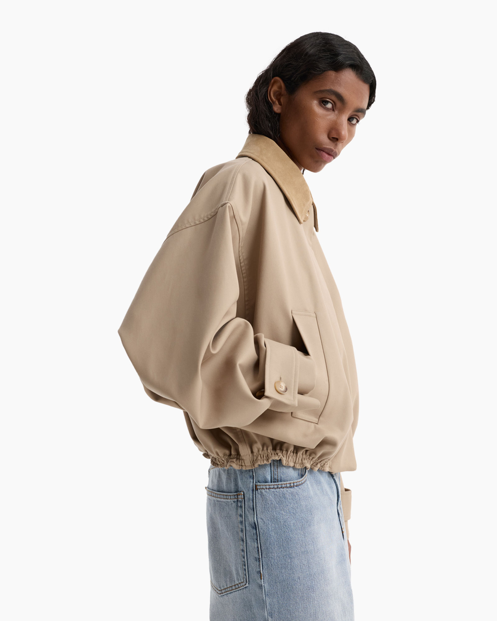 beige jacket, puffer jacket, collar, elastic hem, denim jeans