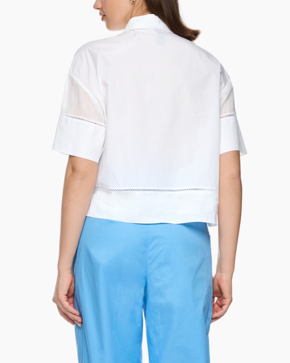 white blouse, linen top, collared shirt, short sleeves, light blue pants