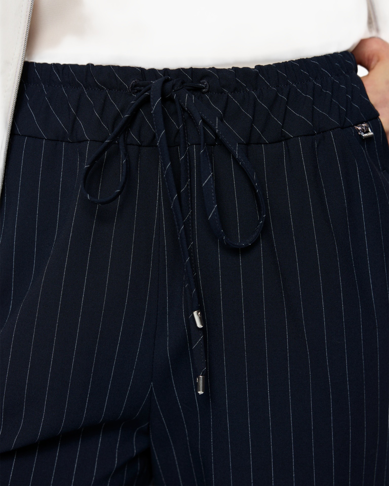 navy pants, pinstripes, drawstring, elastic waist, tapered fit