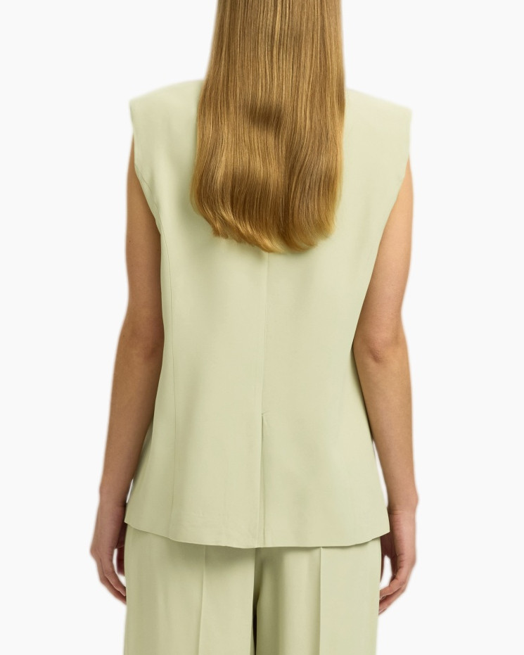 vest, sleeveless, buttoned, pocketless, pastel-green