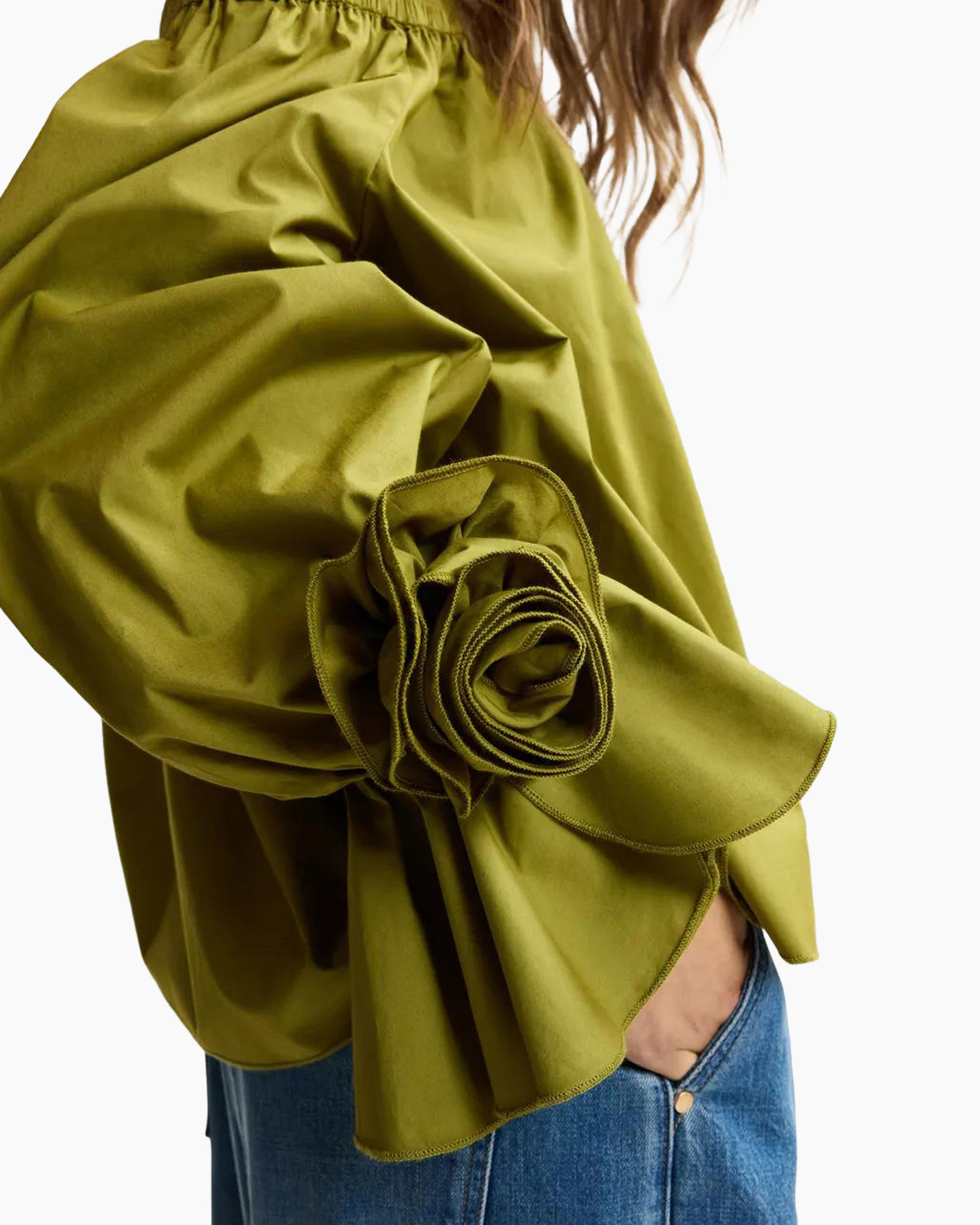 green blouse, ruffled sleeve, floral fabric?, slouchy sleeve, loomed rose detail