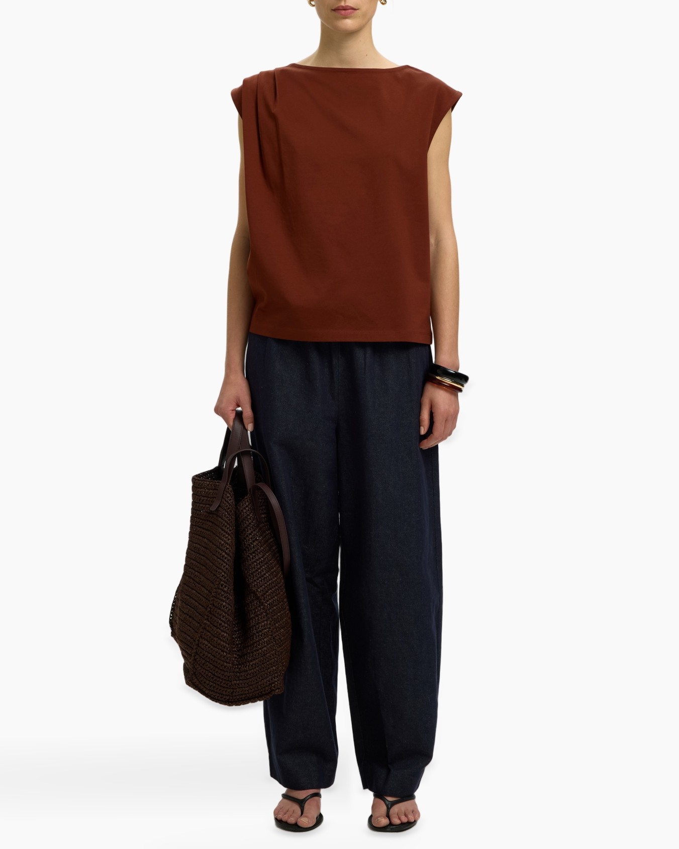 rust-orange top, sleeveless blouse, cotton top, dark denim pants, woven tote bag