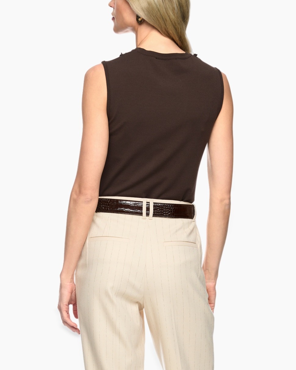 sleeveless top, ruffle detail, brown top, pockets not visible, high neck