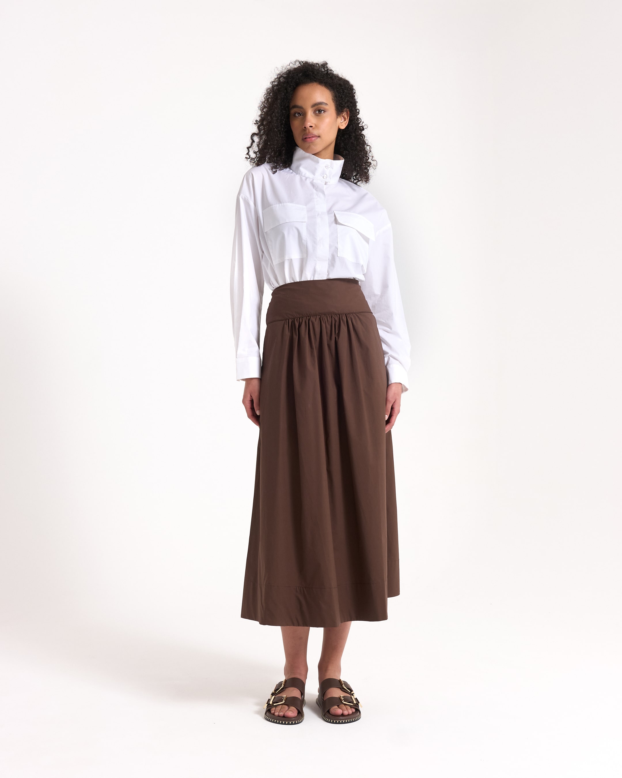 white shirt, button-down, pocketed, collared, brown skirt