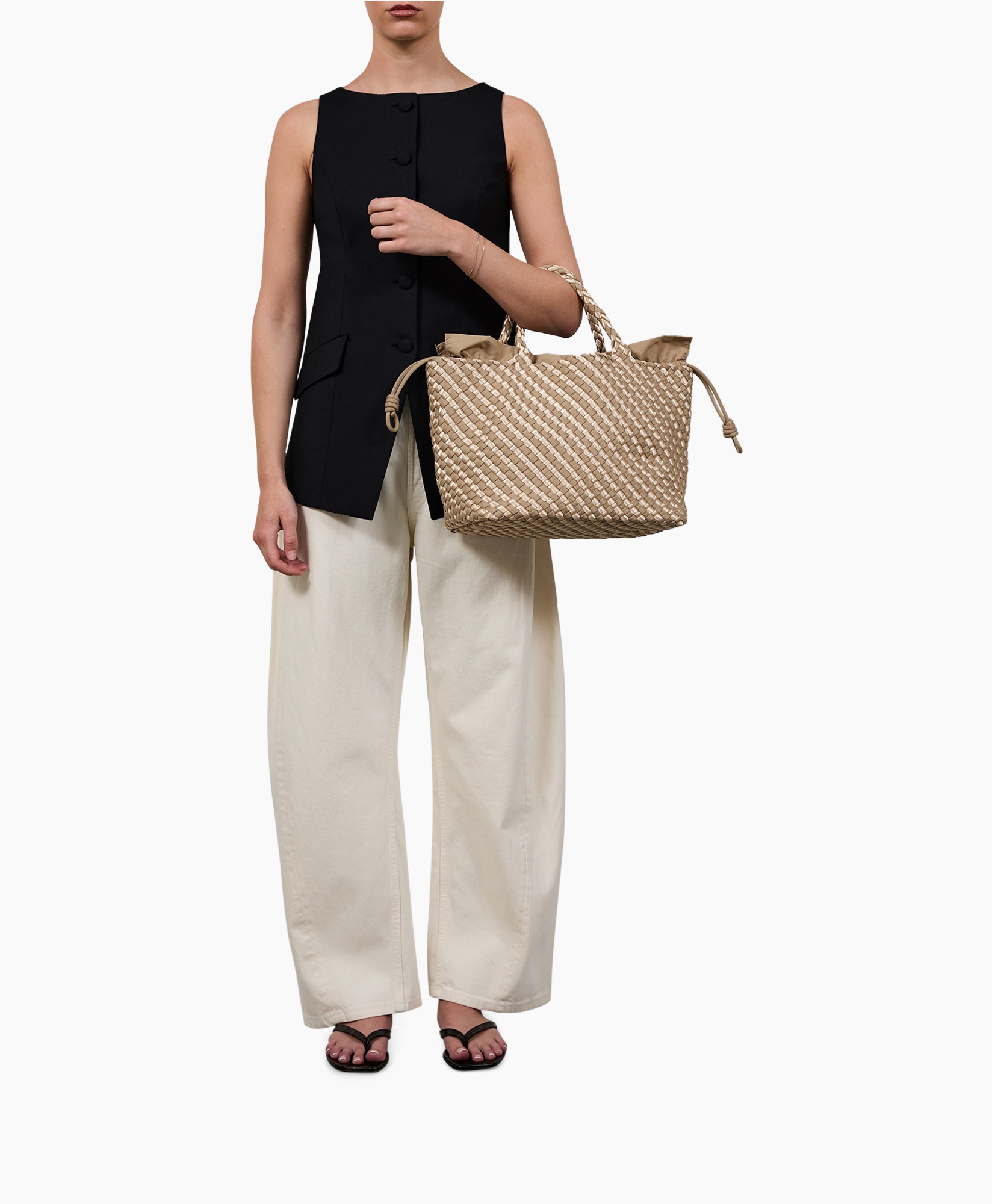 dressy top, black sleeveless top, wide-leg pants, beige tote, woven bag