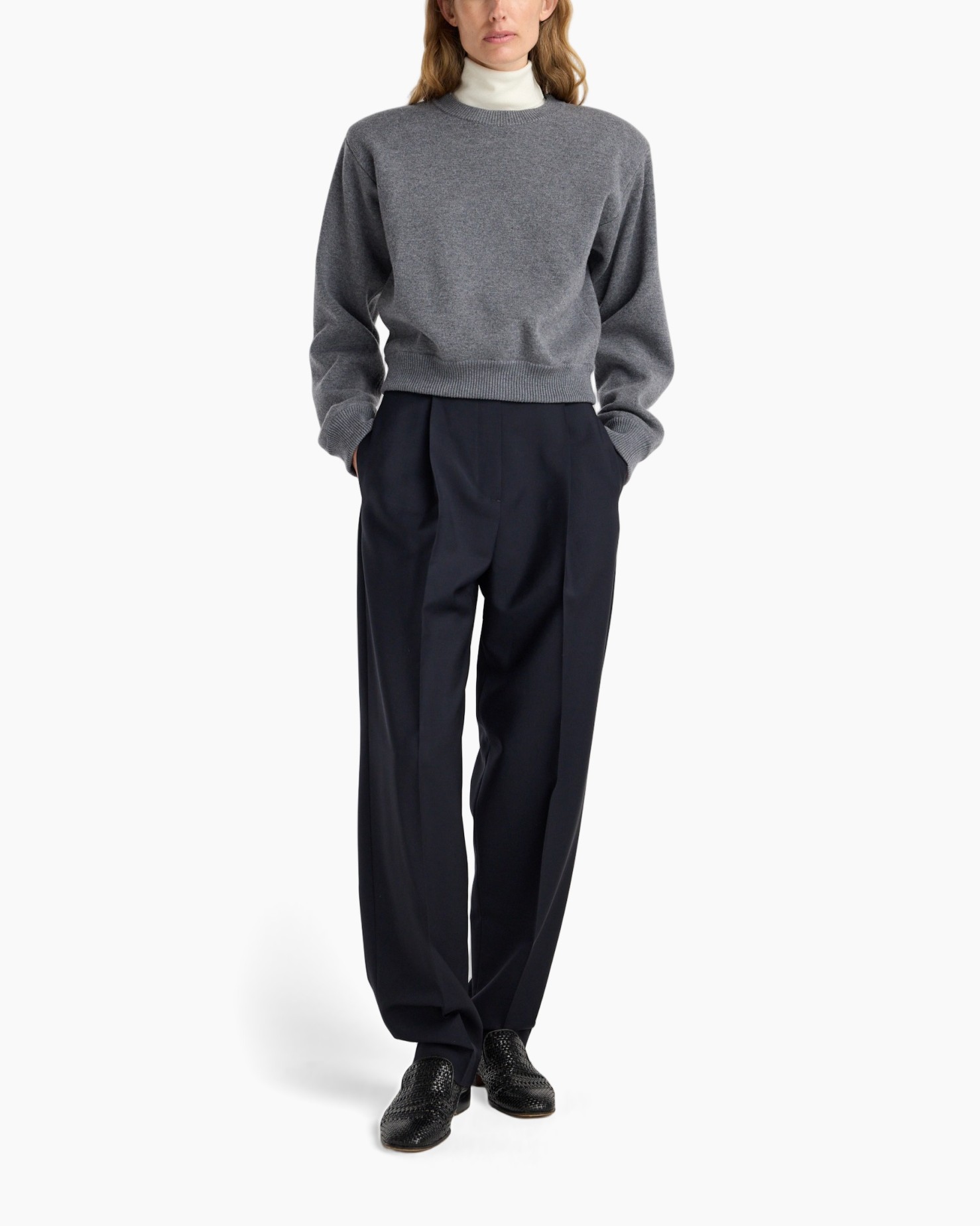 gray sweater, crewneck, long sleeves, relaxed fit, dark trousers