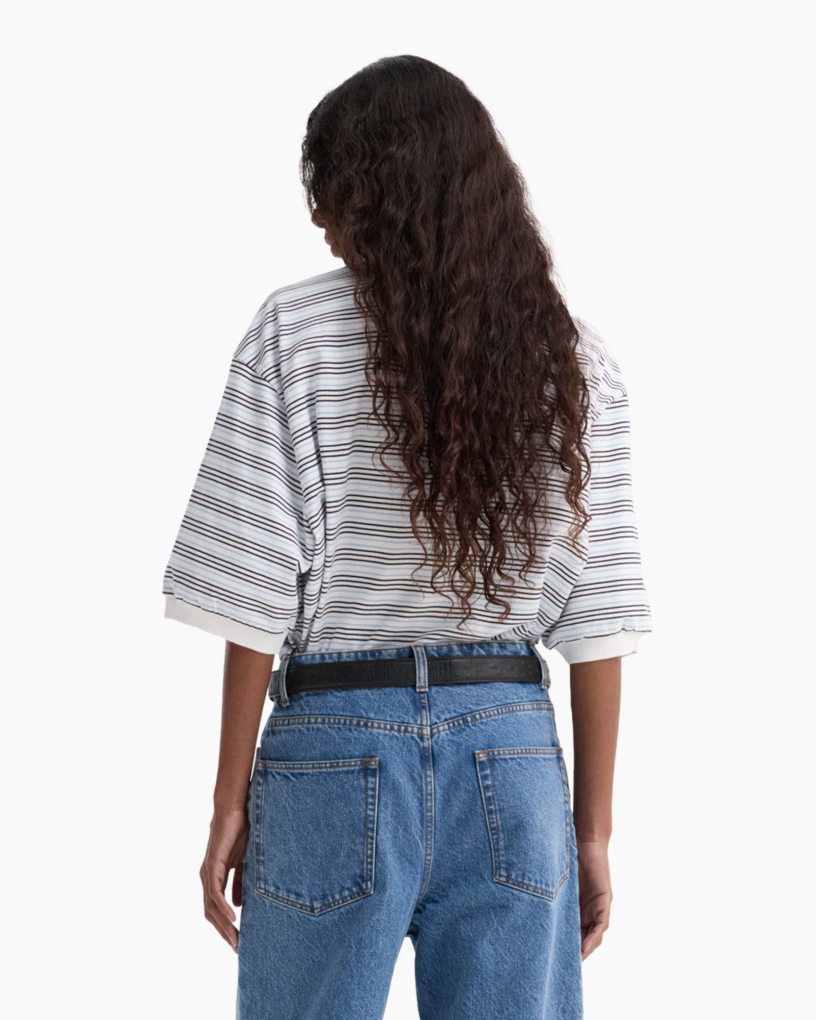 striped polo, collared shirt, three-quarter sleeves, blue jeans, belted outfit, striped polo, striped shirt, collared polo, white collar, short sleeve polo