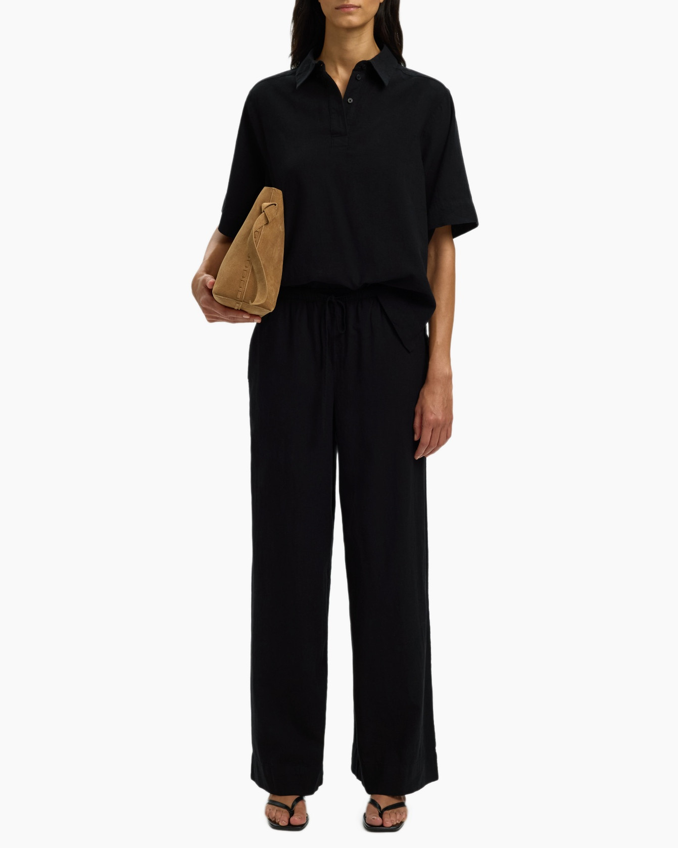 black jumpsuit, crew neck, short sleeve, drawstring waist, sandals