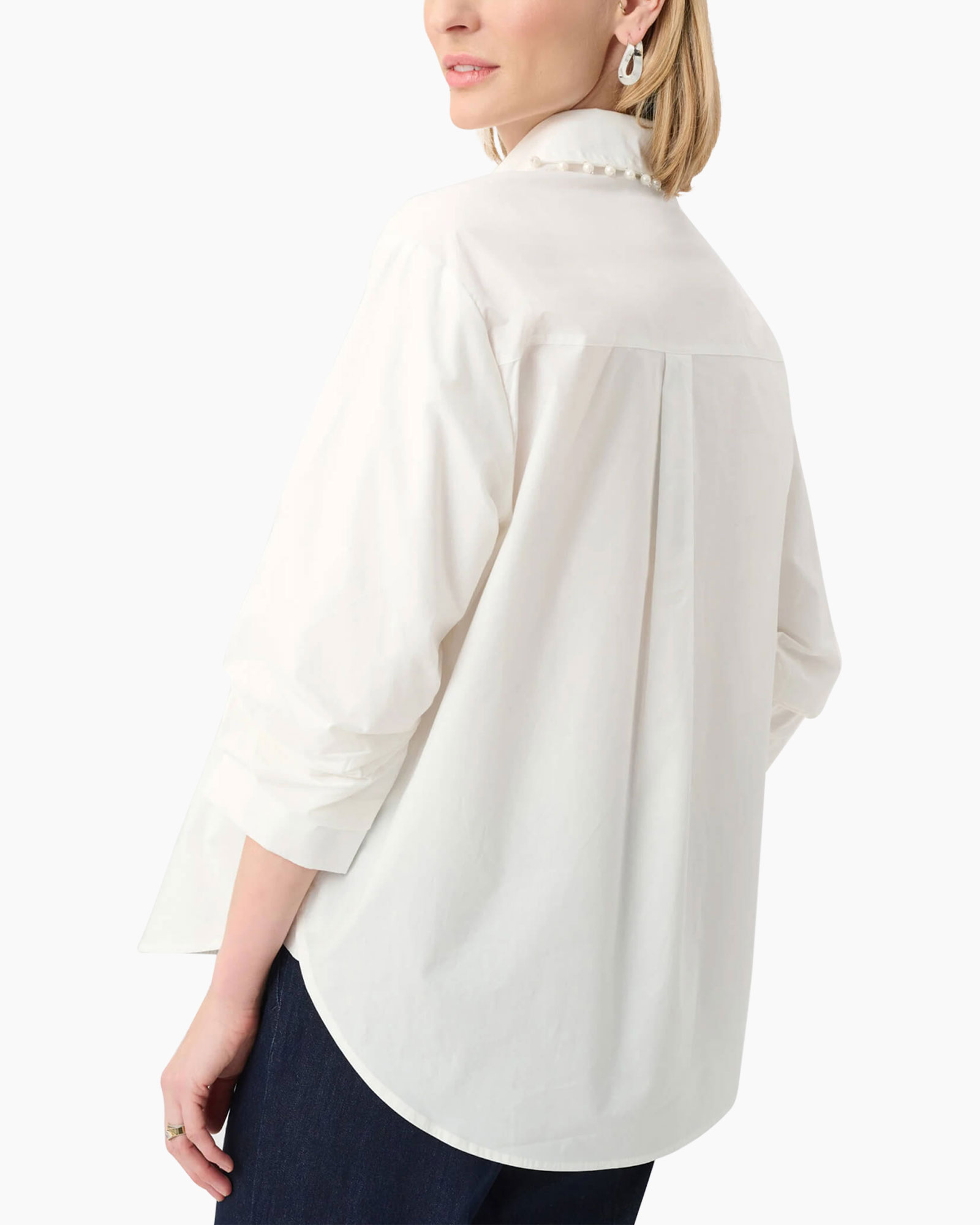 white blouse, button-front, perforated trim, collared shirt, long sleeve