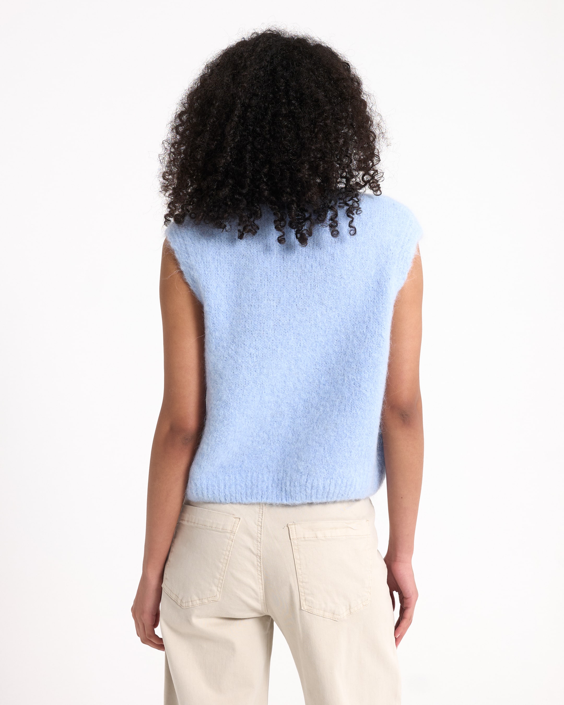 light blue sweater, knitted vest, sleeveless sweater, soft texture, casual top
