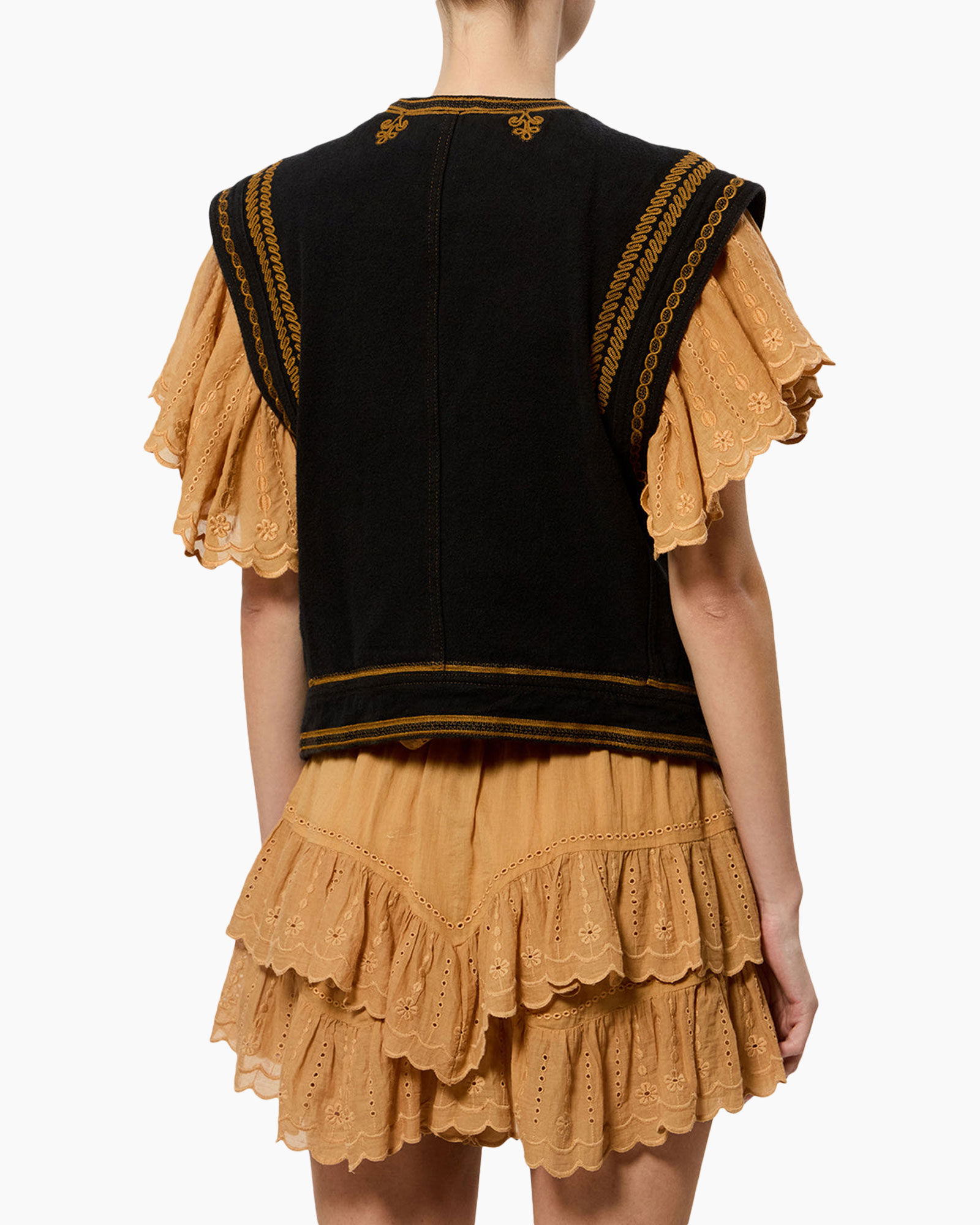 black vest, embroidery, gold trim, tiered lace dress, ruffled sleeves