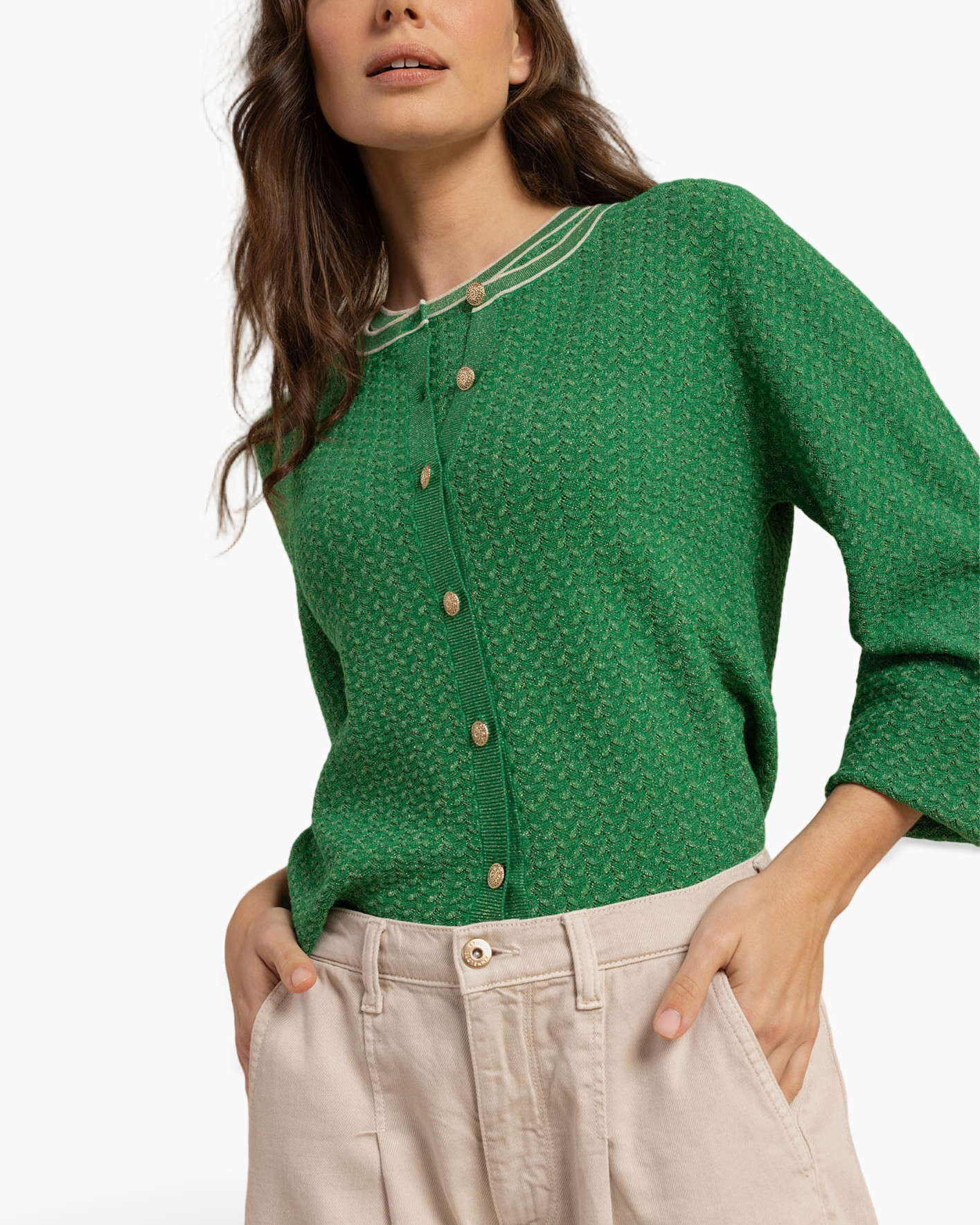 green cardigan, buttoned cardigan, three-quarter sleeves, knit top, beige pants