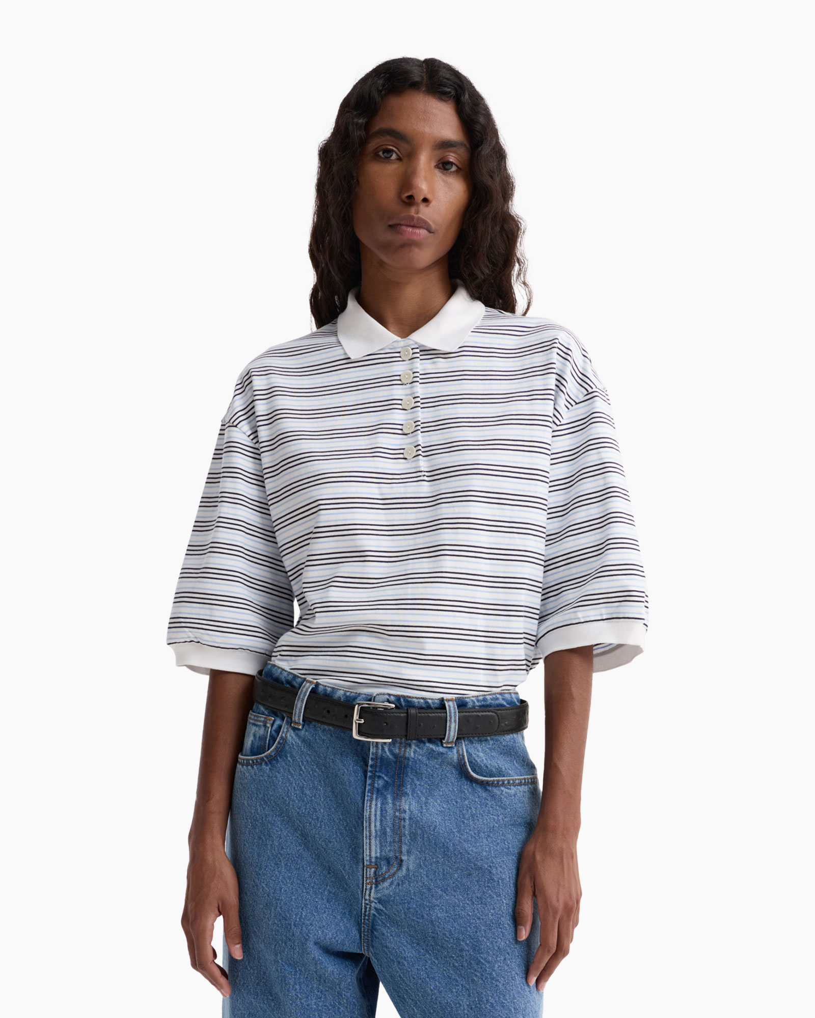striped polo, collared shirt, three-quarter sleeves, blue jeans, belted outfit, striped polo, striped shirt, collared polo, white collar, short sleeve polo