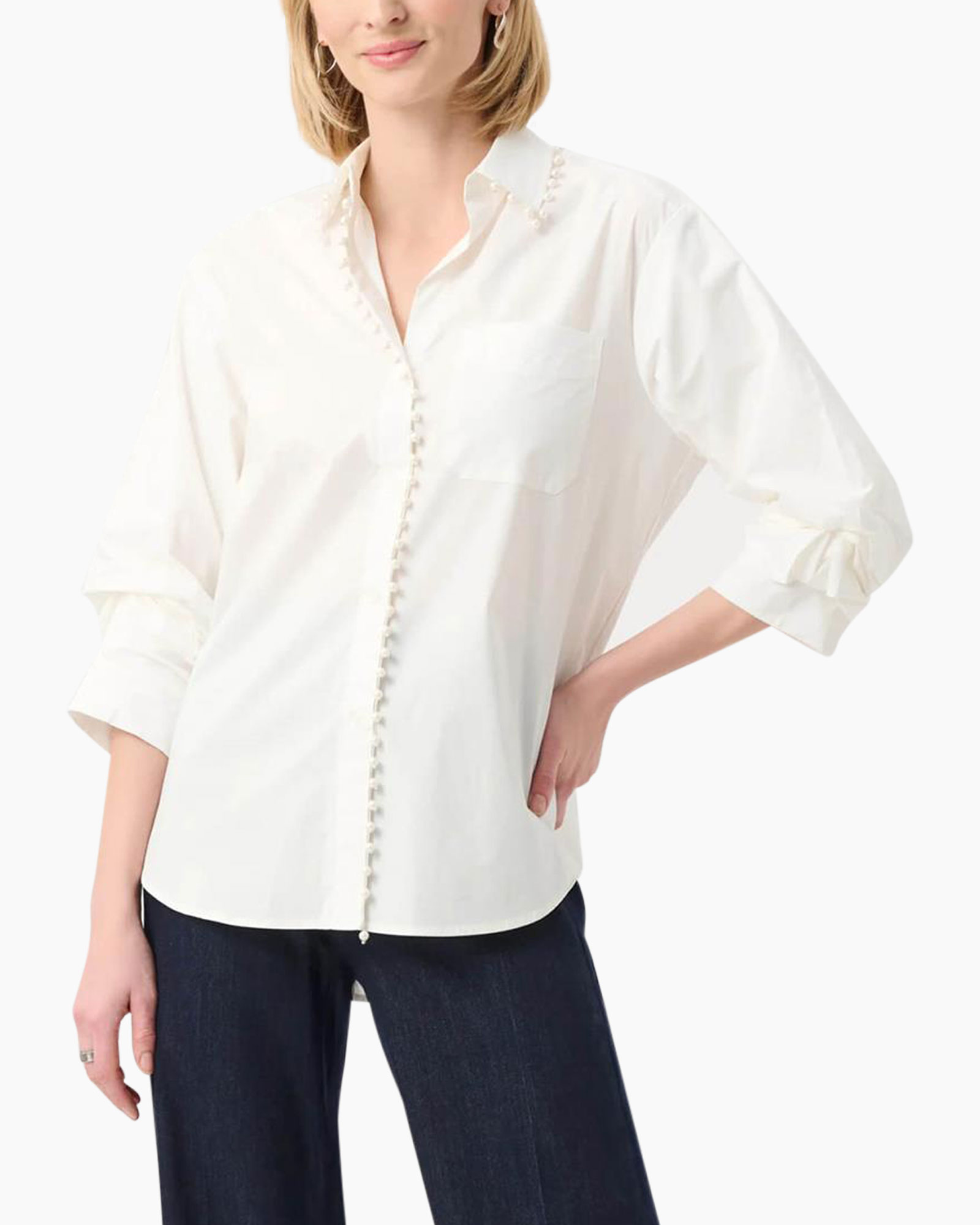 white blouse, button-front, perforated trim, collared shirt, long sleeve