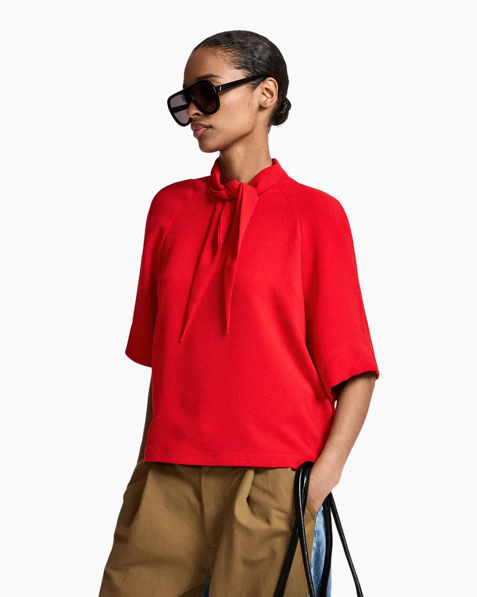 red top, blouse, short sleeves, tie-neck, sunglasses