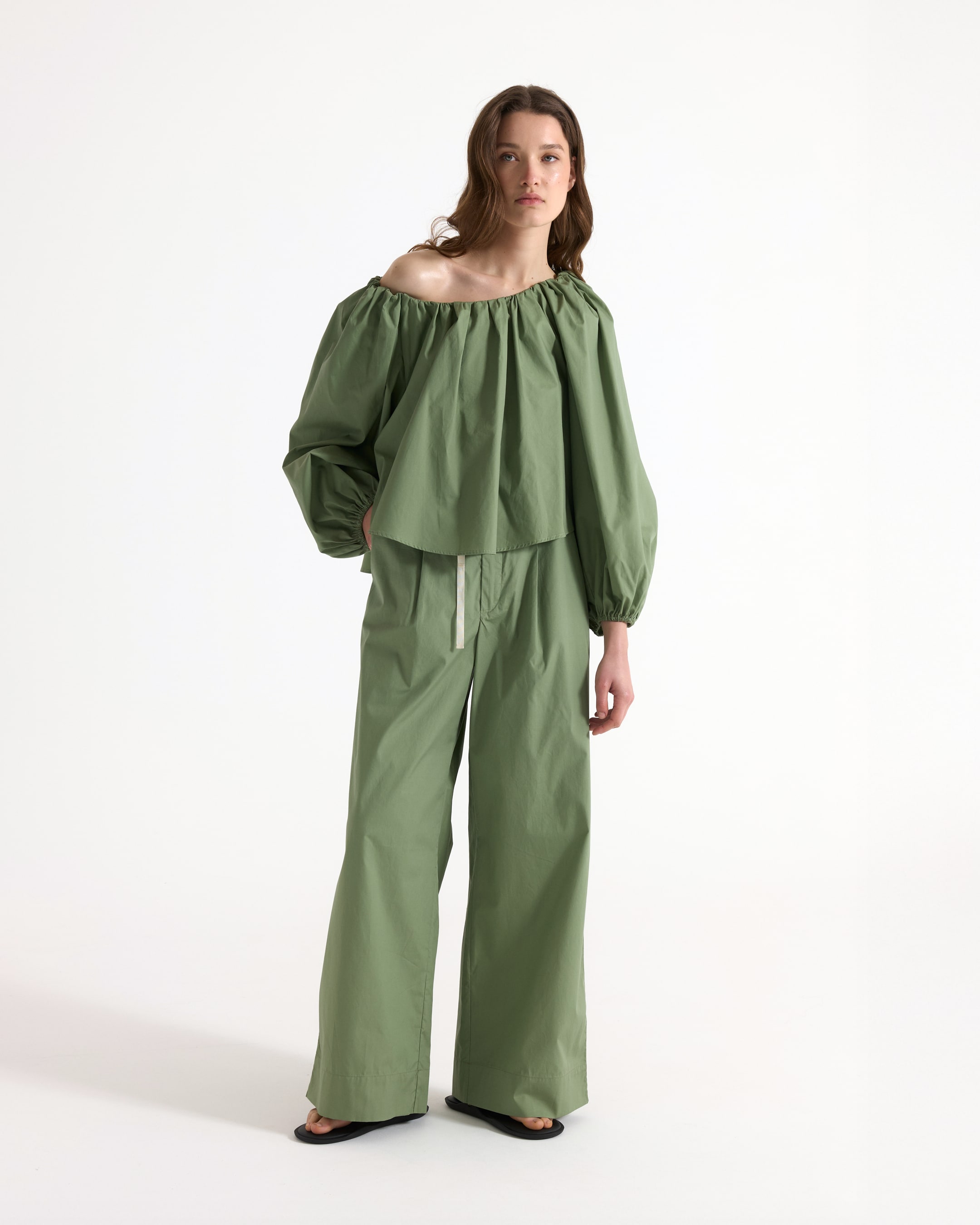 off-the-shoulder, green top, puff sleeves, wide-leg pants, relaxed fit