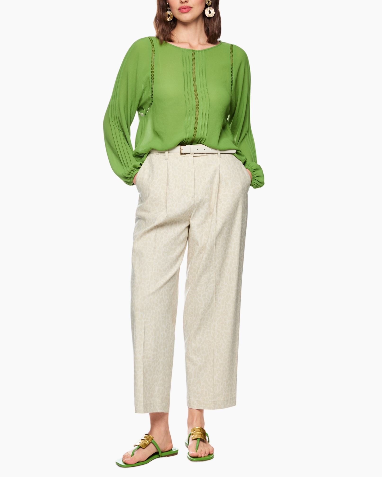 green blouse, pleated sleeves, embellished trim, beige wide leg pants, leather belt