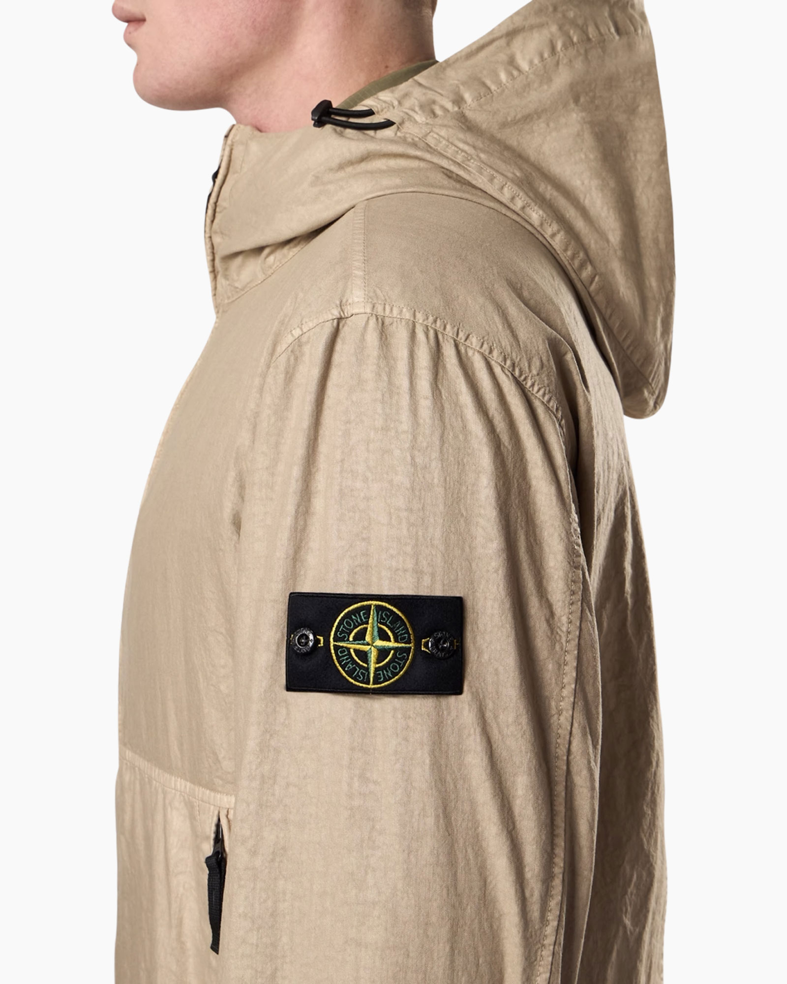 beige jacket, hooded, pont patch, stone island (brand visible), waist zipper pocket