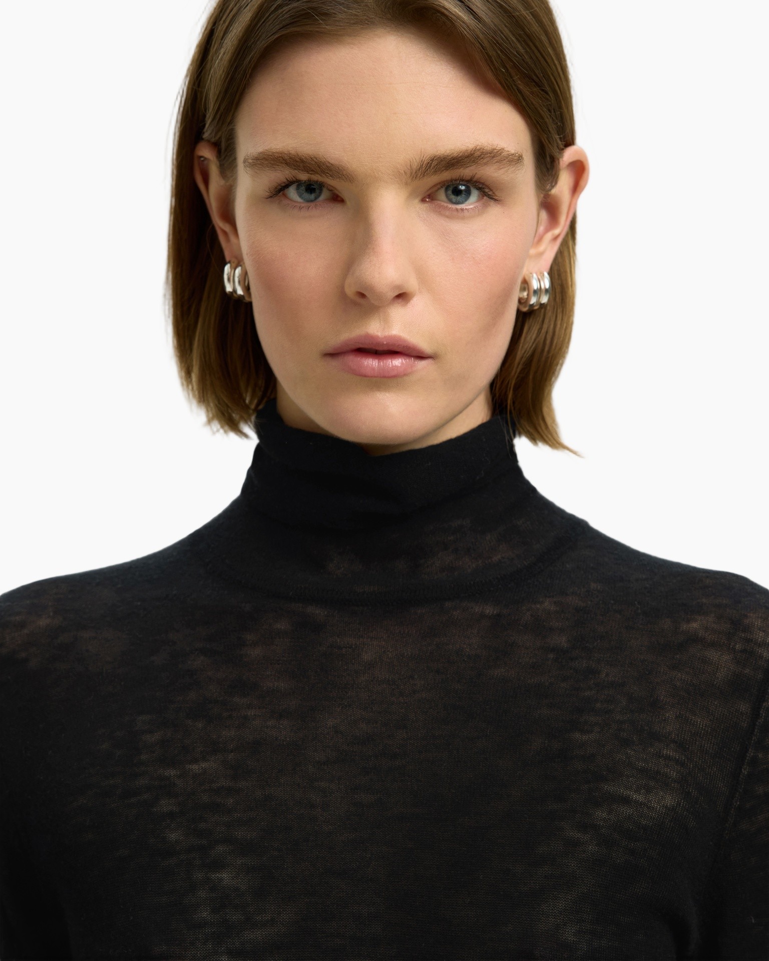 turtleneck, black, sheer, knit, earrings
