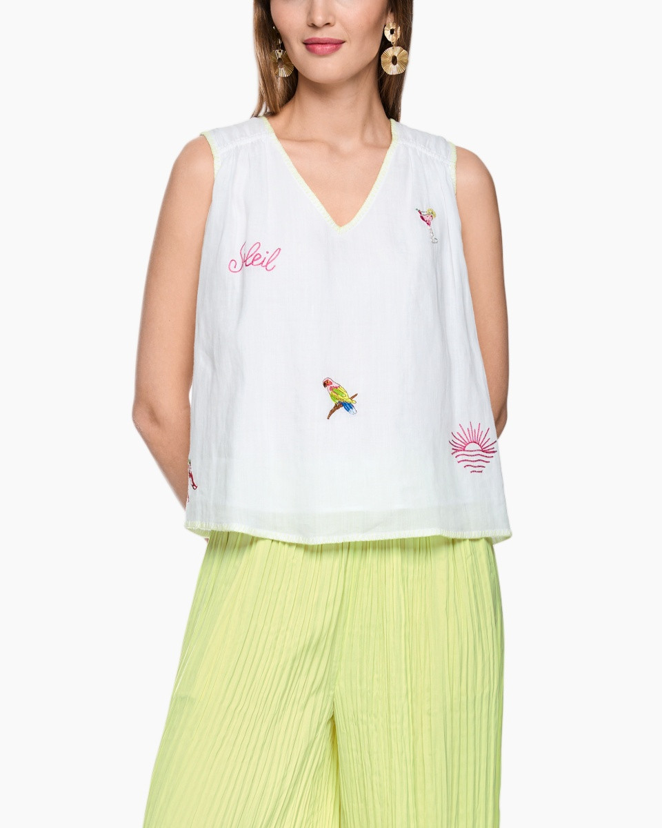 white sleeveless top, embroidery, bird print, V-neck, lime green pants