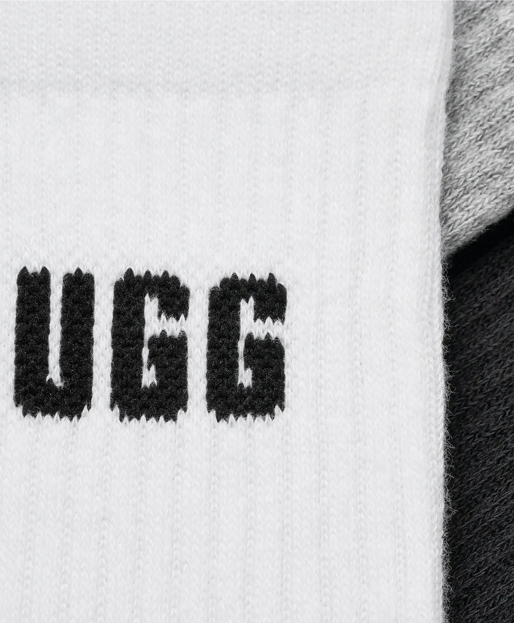 socks, white, black text, knit, UGG?