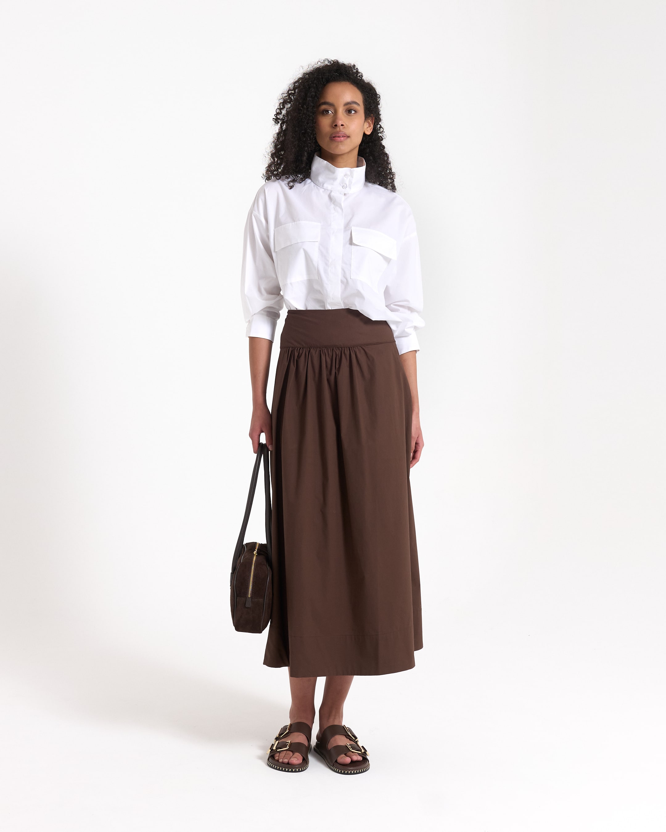 white shirt, button-down, pocketed, collared, long skirt