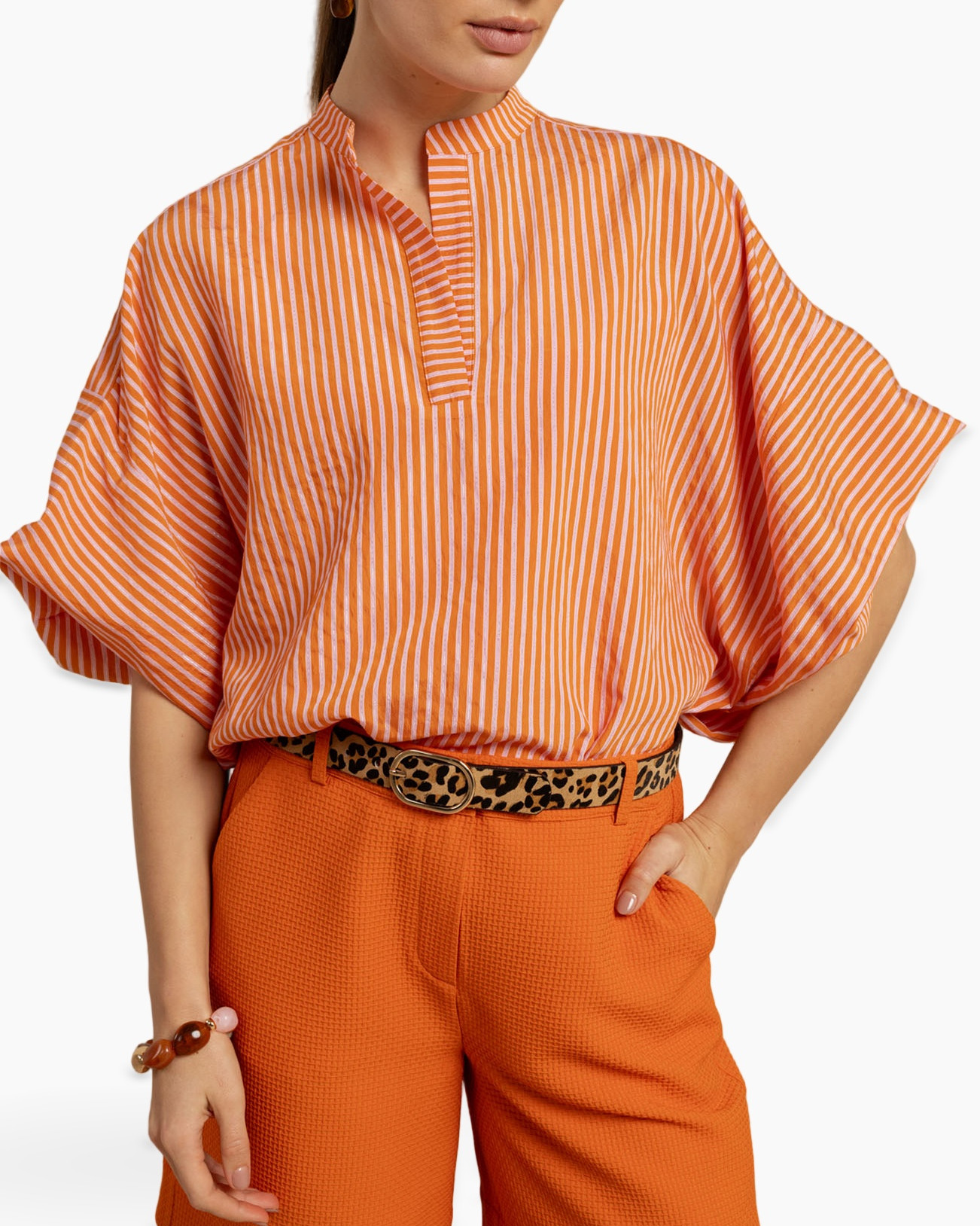 orange striped top, polo neck, short sleeve, kimono sleeve, orange pants