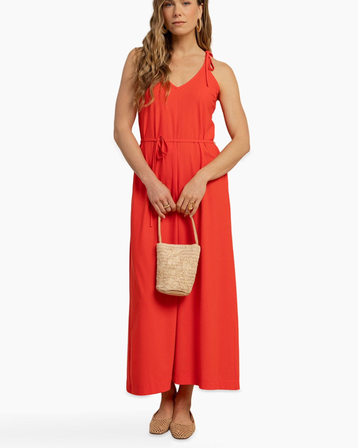 strapless?, red jumpsuit, wide-leg, linen?, bag, sandals