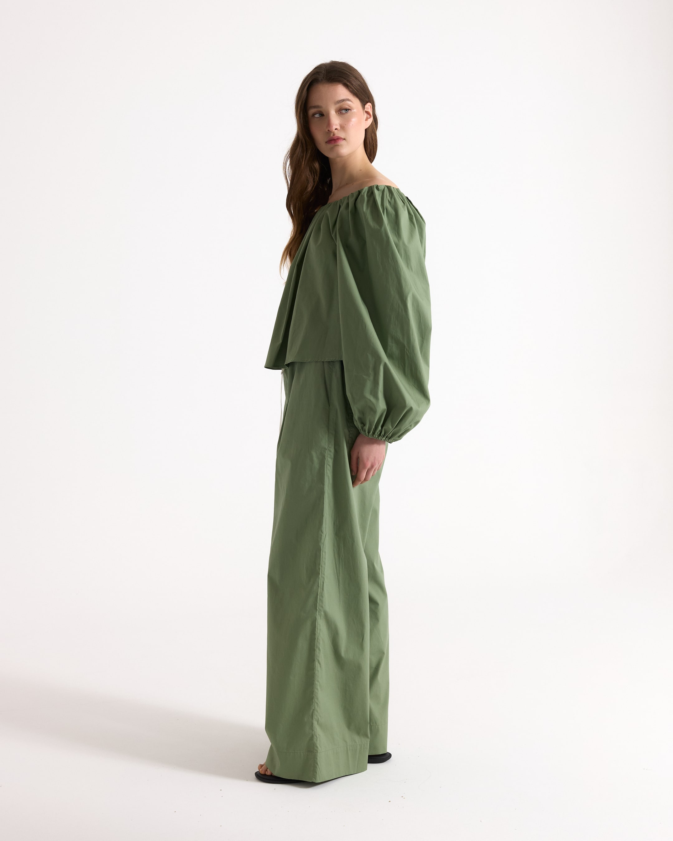 off-the-shoulder, green top, puff sleeves, wide-leg pants, relaxed fit