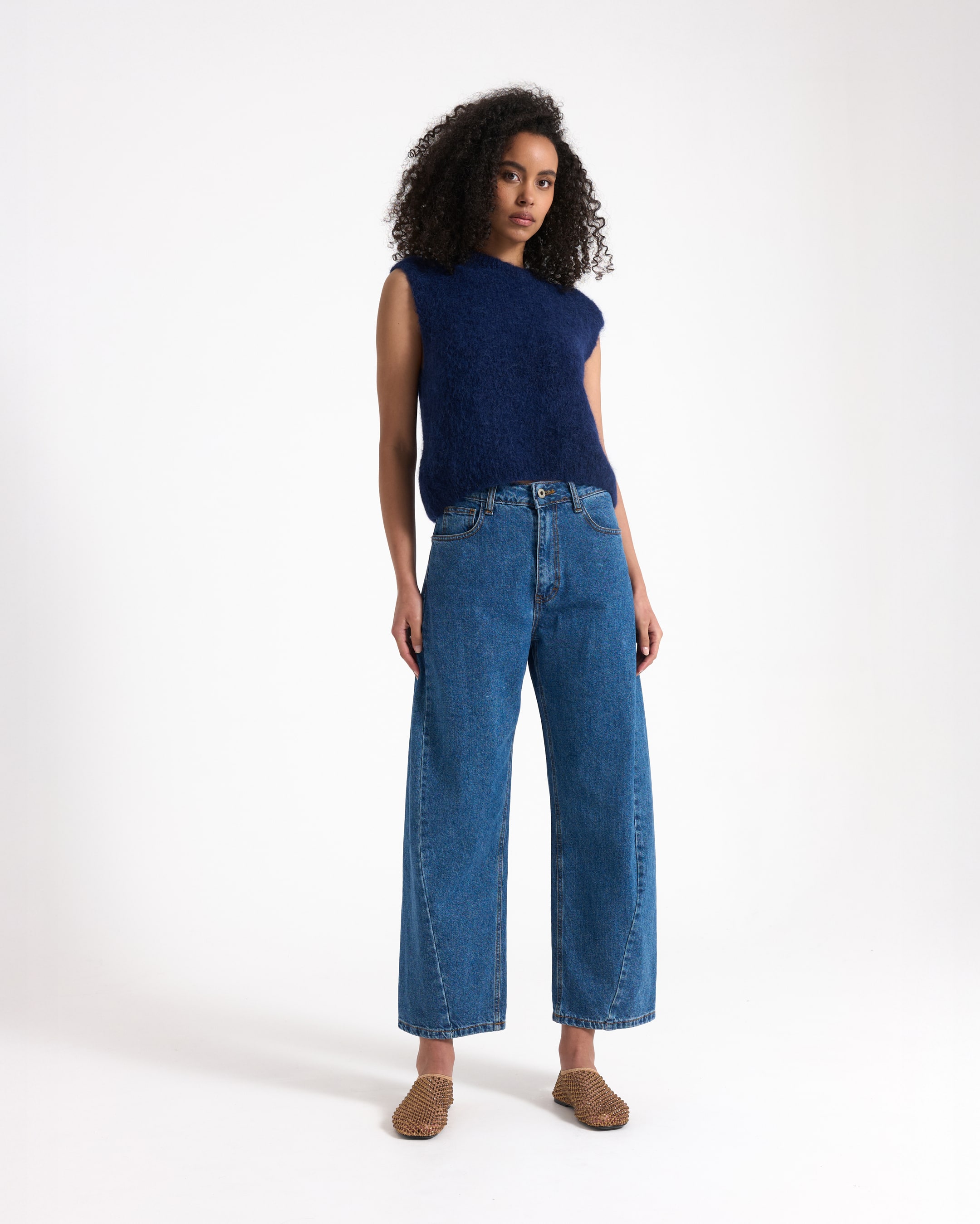 sleeveless top, knit top, navy blue, high-waisted jeans, wide-leg jeans